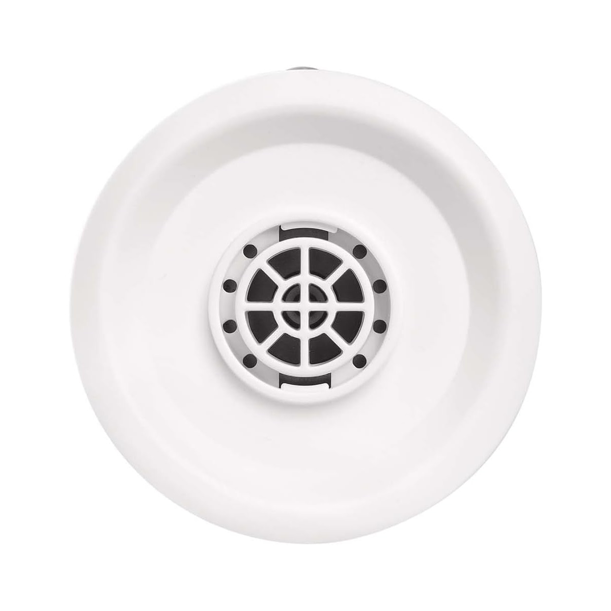 Biały, okrągły obiekt. Ma centralny, czarny, okrągły otwór. Obiekt ma szereg czarnych kropek.