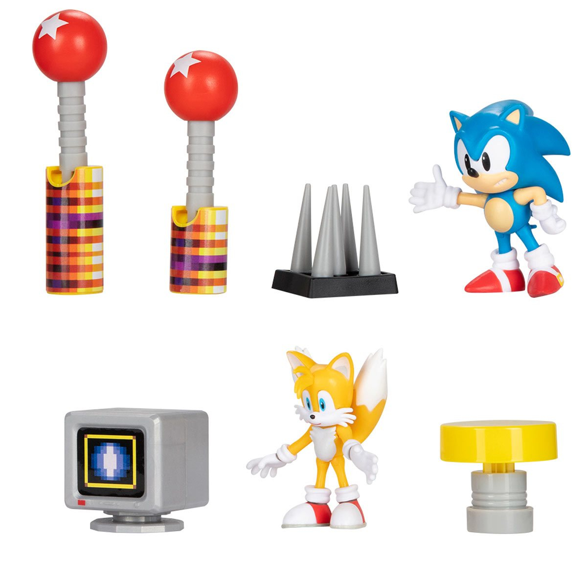 Sonic-Spielzeug: roter Ball am Stab, Stacheln, Sonic-Figur, Tails-Figur, Fernseher und gelber Knopf.