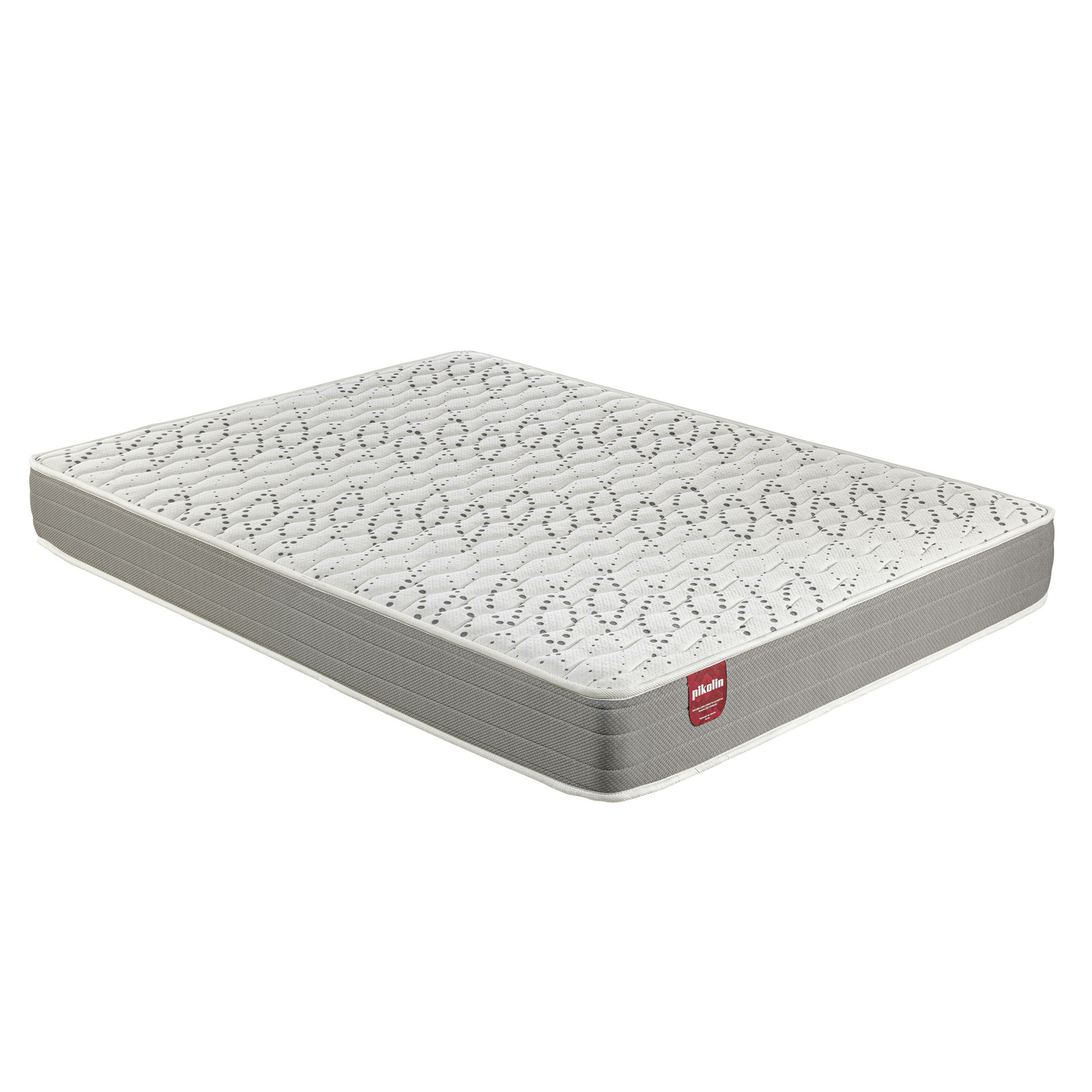Colchón blanco con borde gris, parte superior estampada con etiqueta 'Pikolin'.