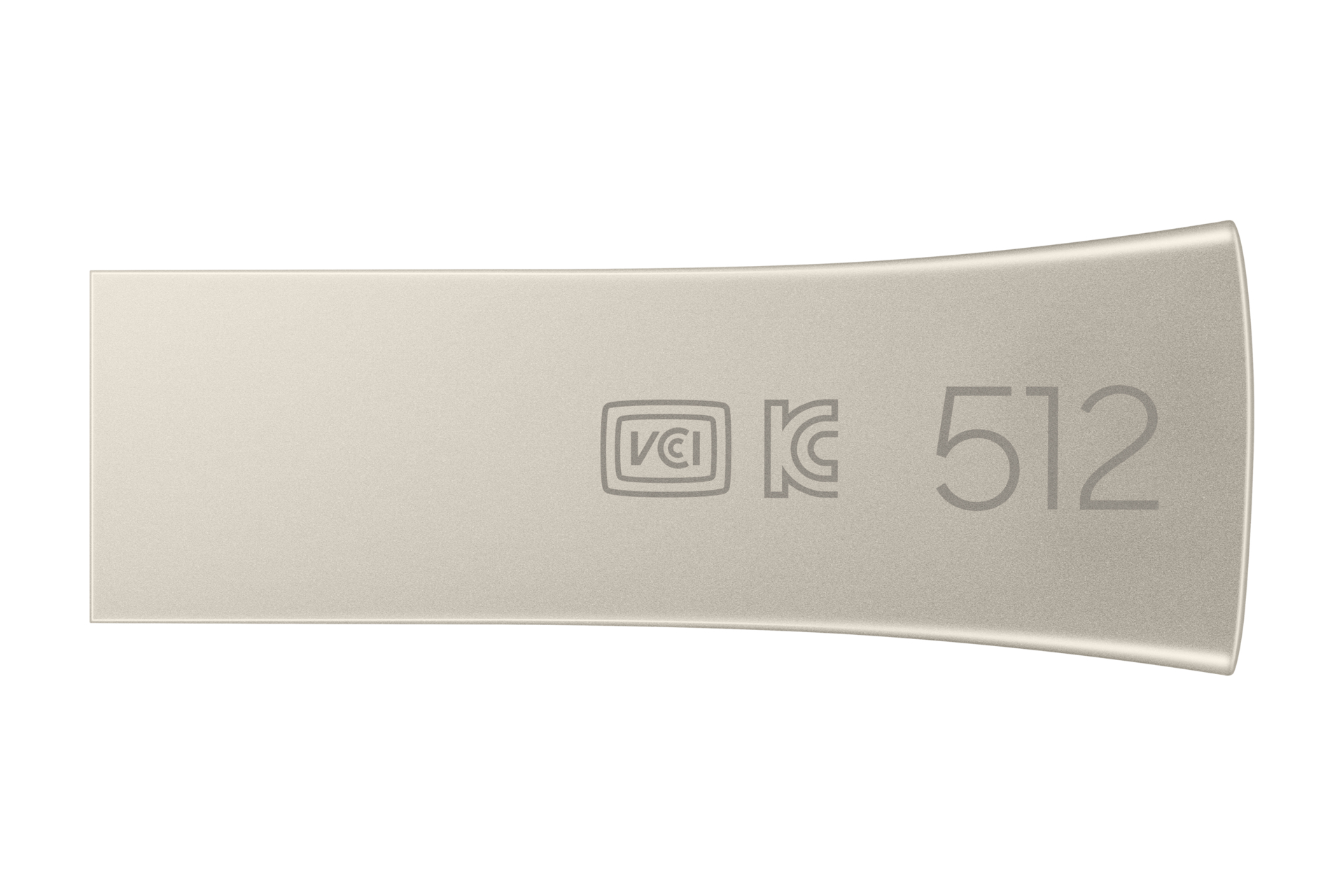 Unidad USB plateada con marcas. La unidad tiene un diseño curvado, sobre blanco.