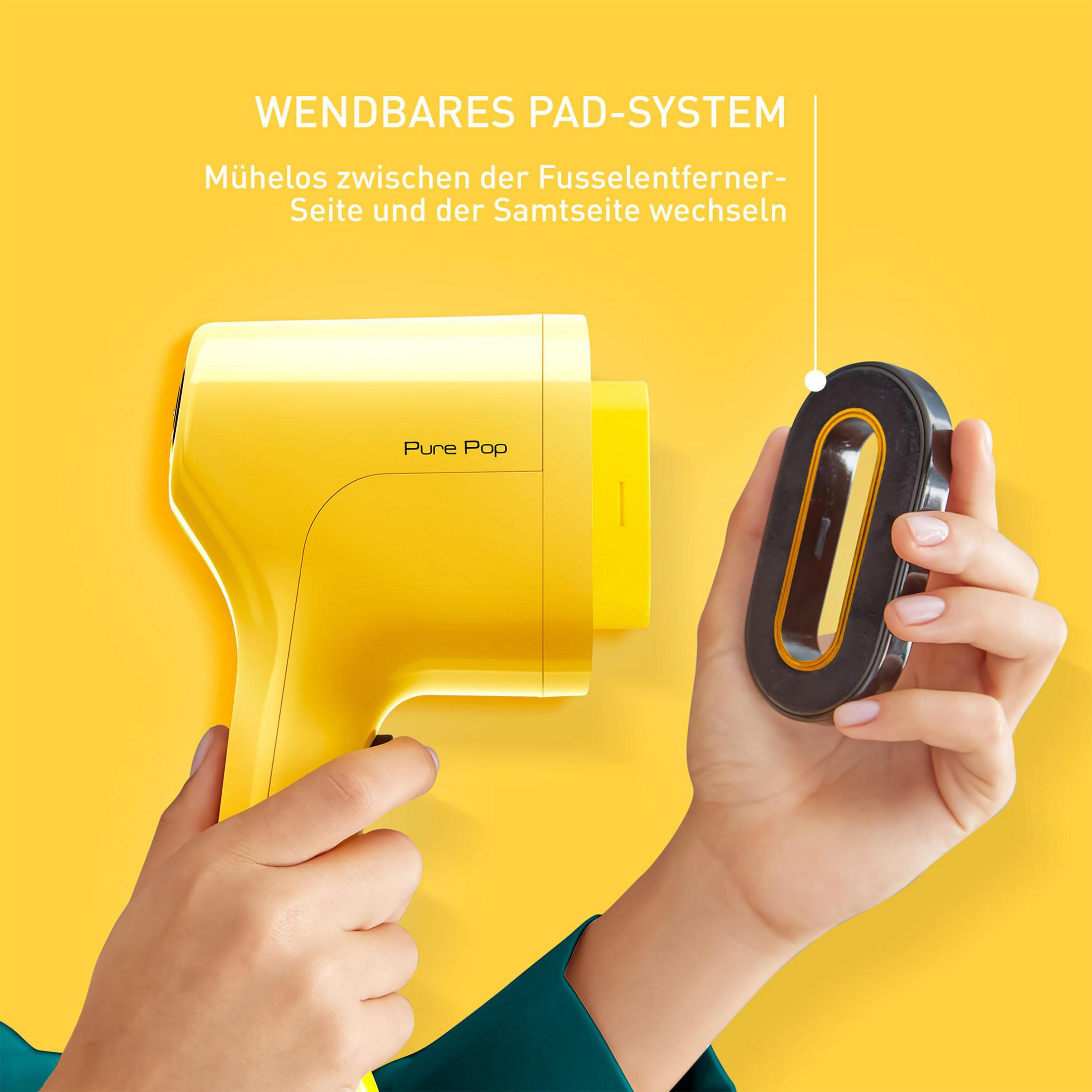 Una mano tiene un cuscinetto nero accanto a uno vaporizzatore portatile giallo. Sfondo giallo.