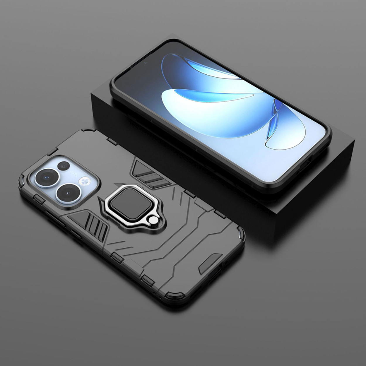 Twee grijze telefoonhoesjes met ringhouders op een zwart oppervlak. Eén heeft een telefoon erin.