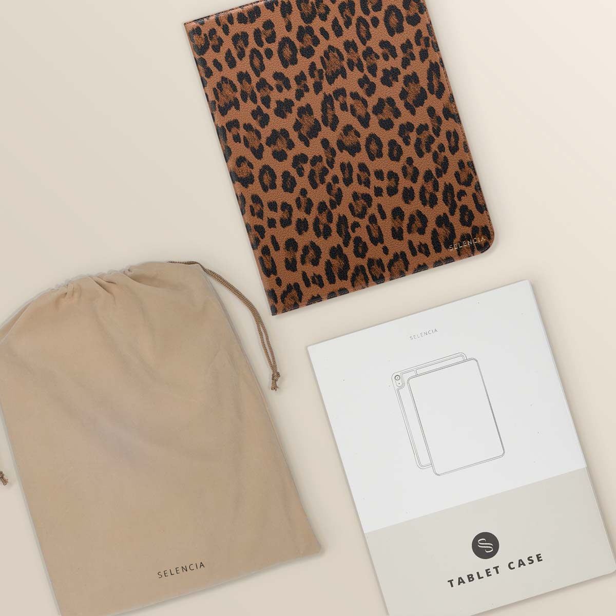 Tablet case, bag, and product information with leopard print.