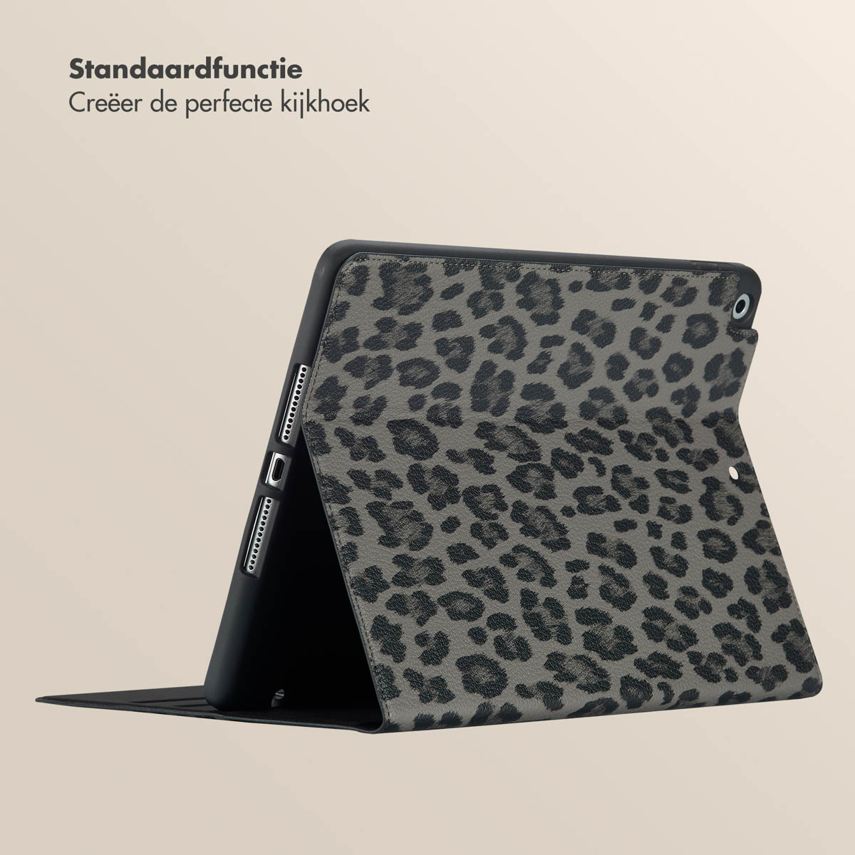 Tablet with leopard print cover. Black case, folded open. Beige background.