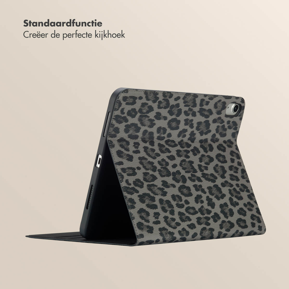 Tablet case with leopard print. Tablet open. Beige background.