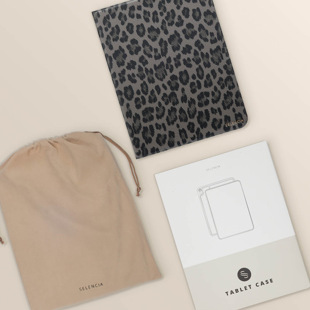 A tablet case, a storage bag, and a product box, all with the 'Selencia' brand name on them.