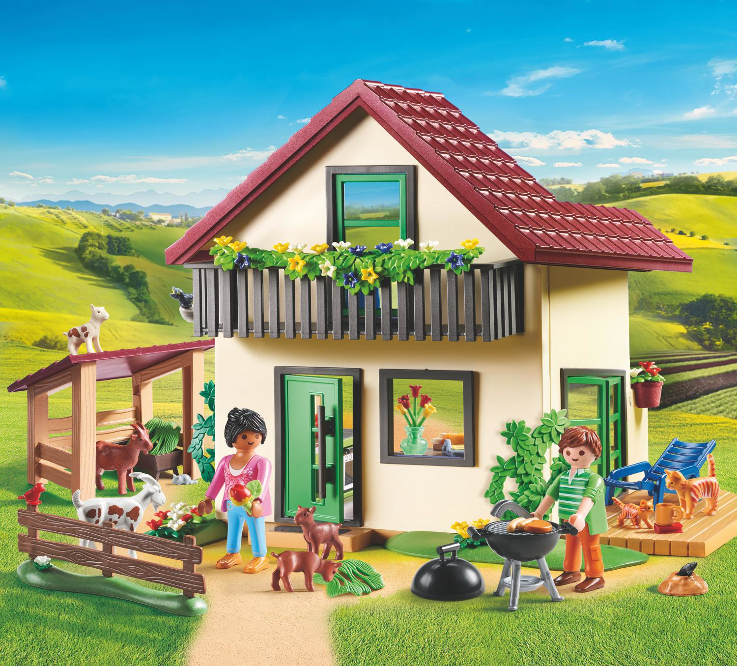 Playmobil Country set with a house, figures, a barbecue, and farm animals.