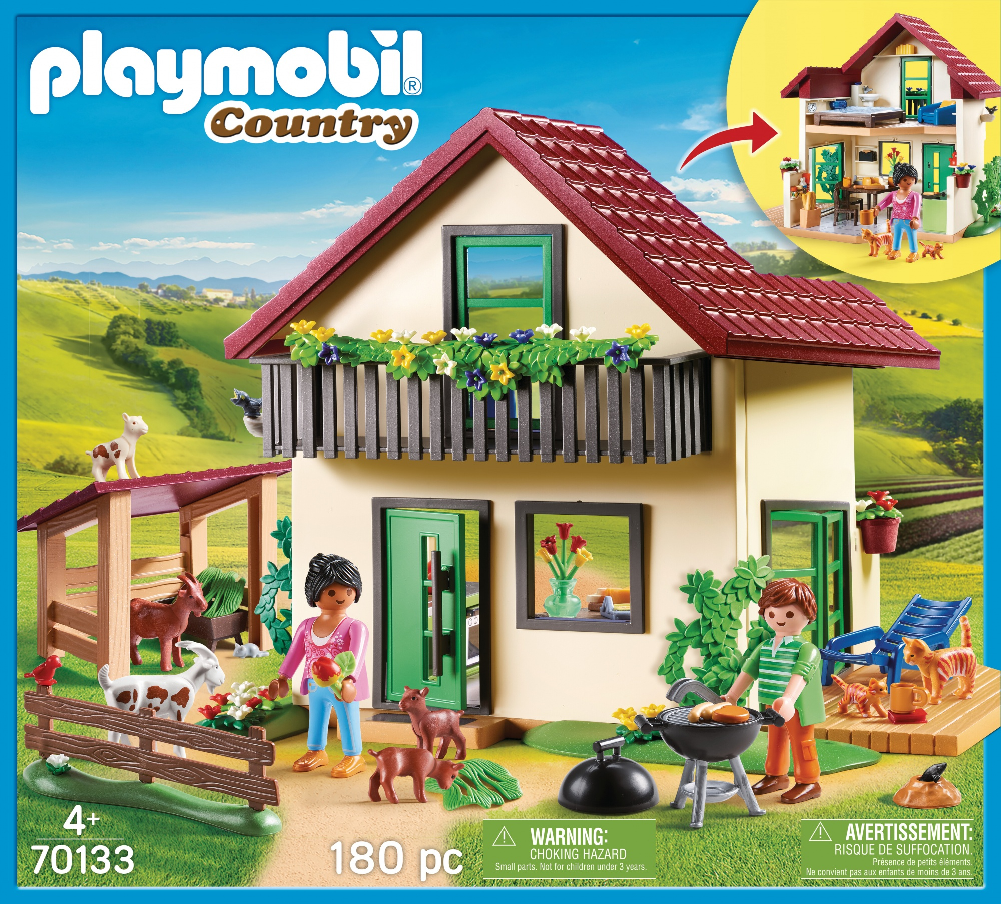 Playmobil country house set. Figures, animals, house, and garden. Boxed with image of house.