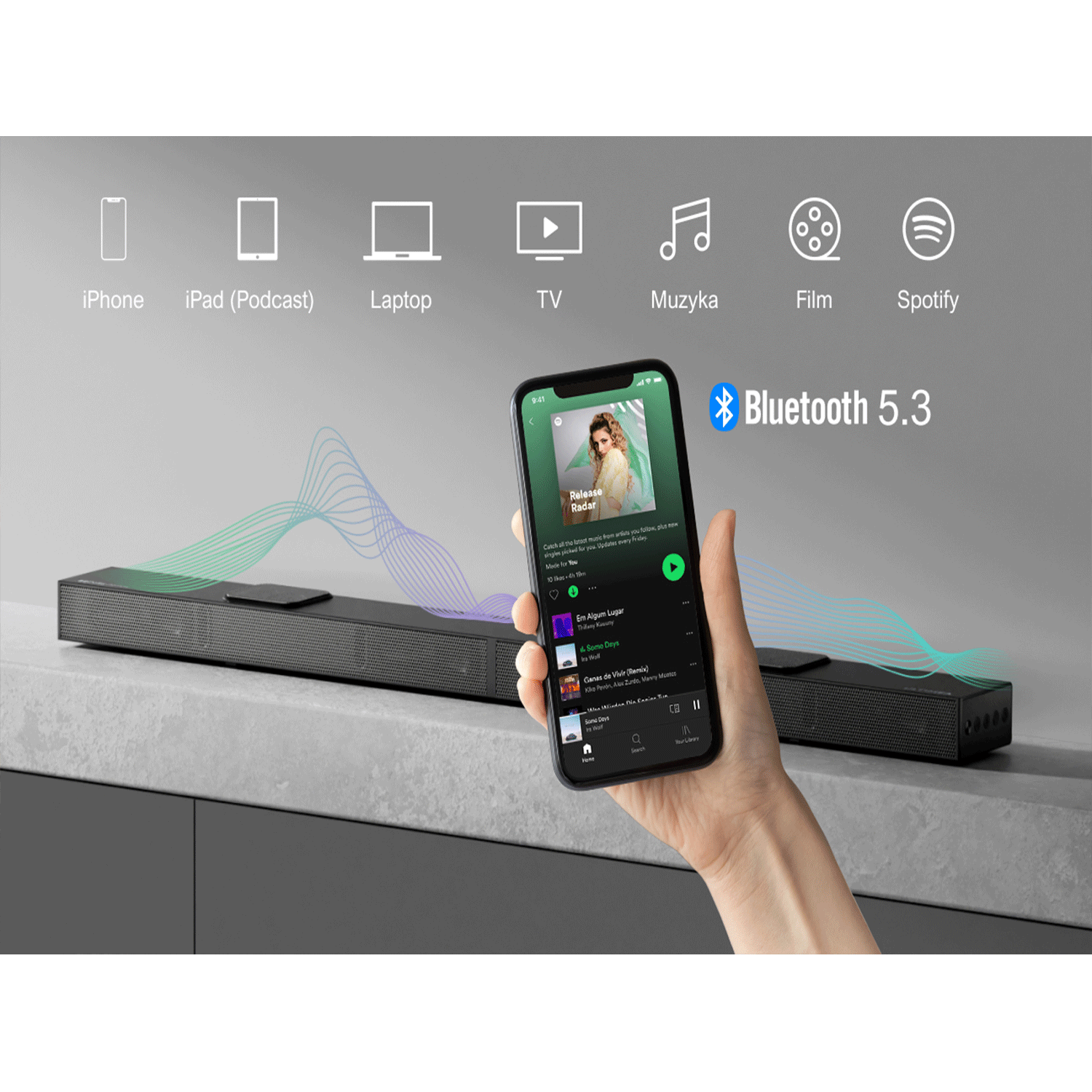 Soundbar z telefonem wyświetlającym Spotify i różnymi ikonami aplikacji.