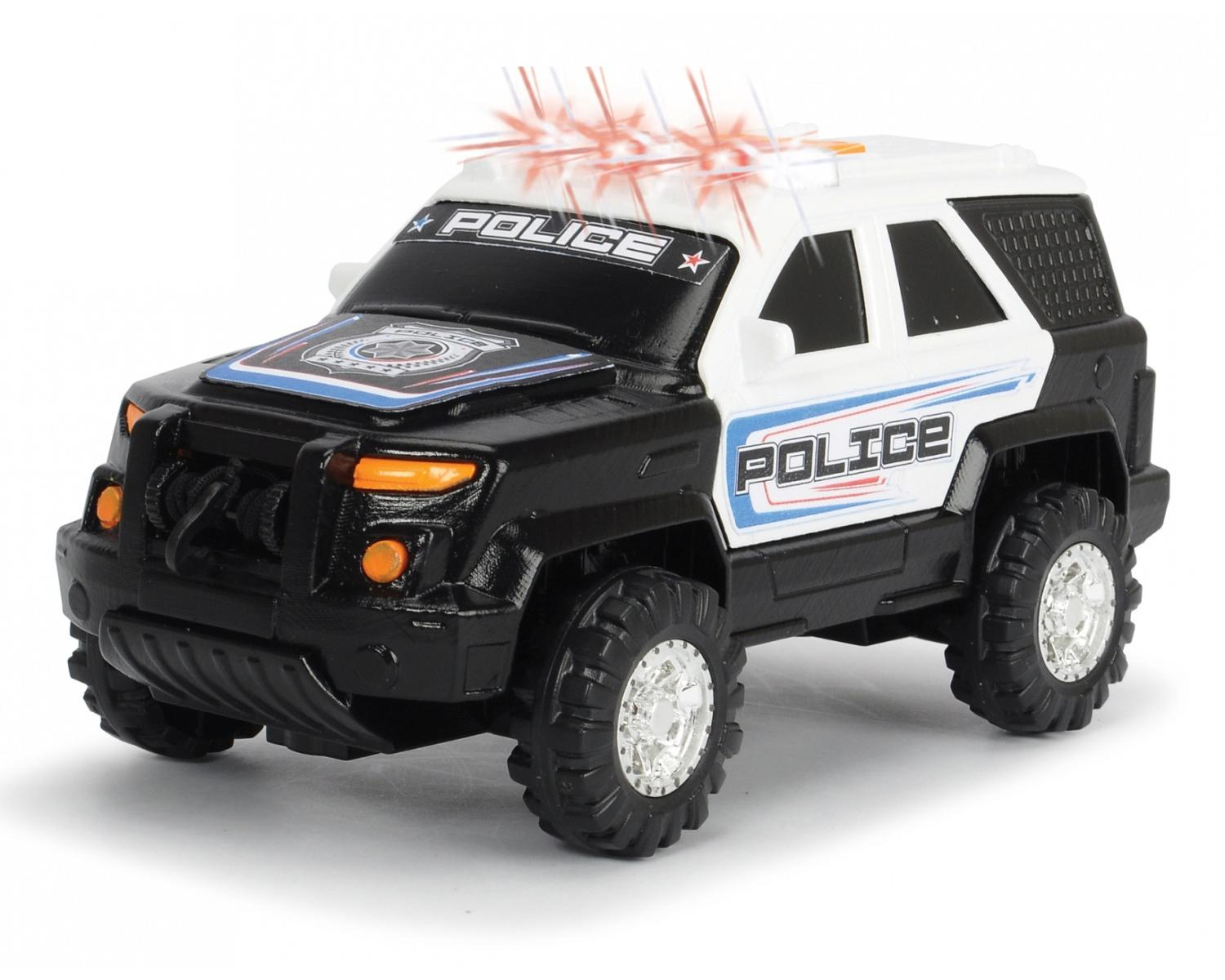 Zabawkowy radiowóz policyjny z migającymi światłami, czarno-biała kolorystyka, napis 'POLICE'.
