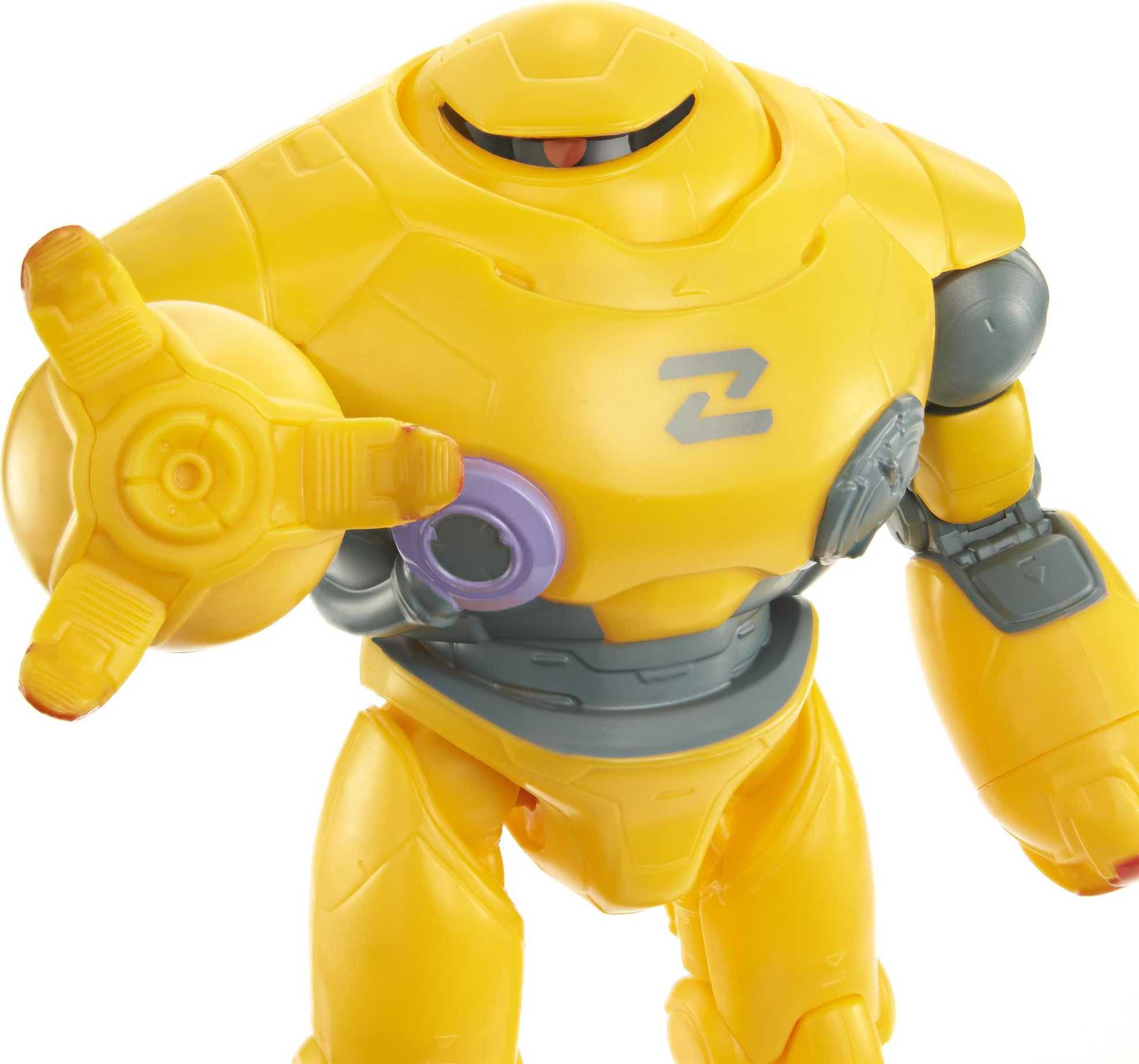 Un giocattolo robot giallo con un logo blu e accenti viola, su sfondo bianco.
