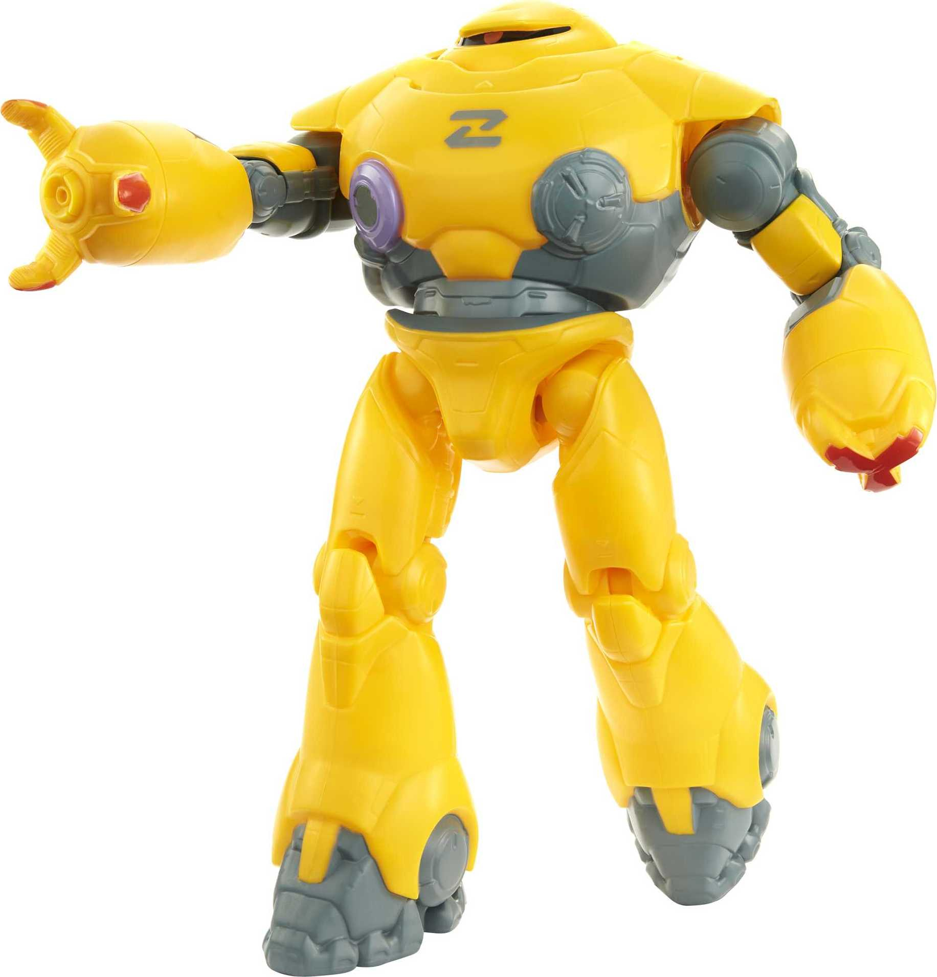 Giocattolo robot giallo con logo 'Z' sul petto, braccio alzato e dettagli grigi. È in piedi.