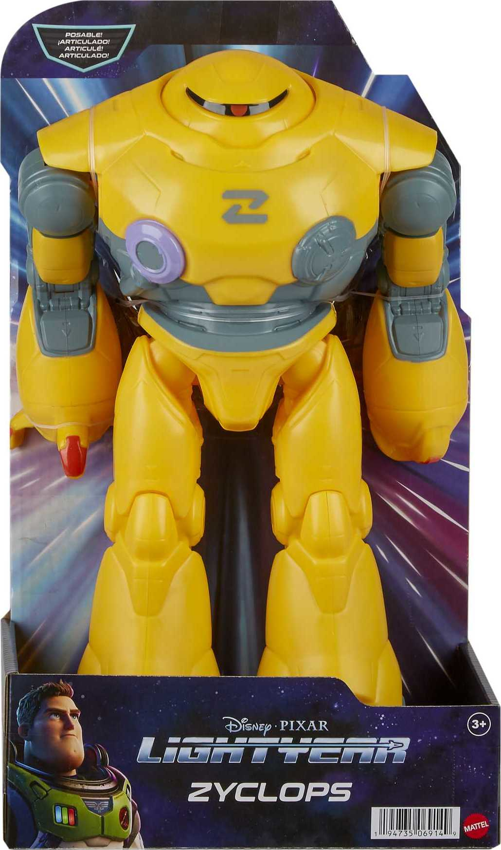 Un robot giocattolo Zyclops giallo in una scatola. Il robot è in posizione eretta.