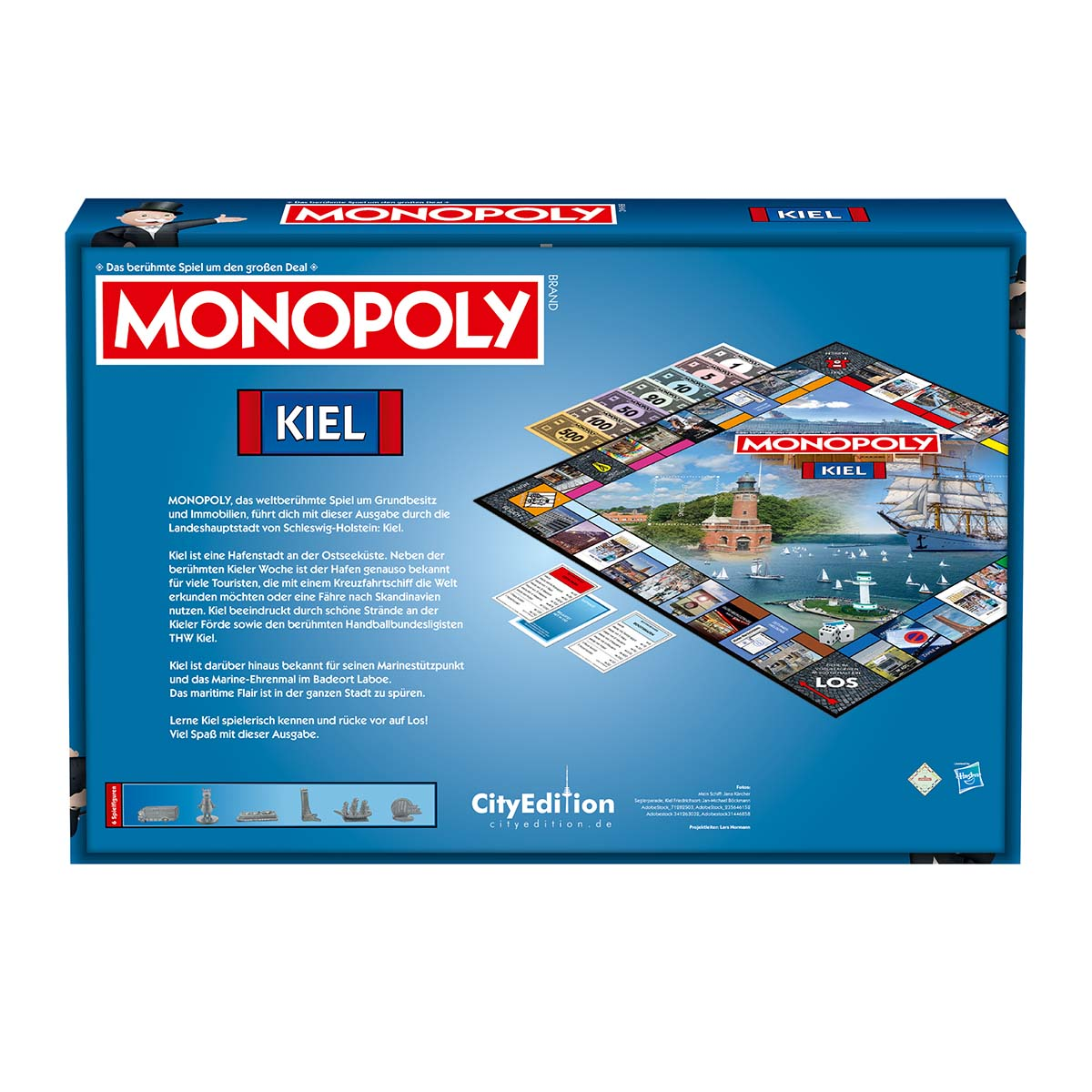Monopoly Kiel Brettspiel. Blaue Box mit Spielbrett und Text. Bilder von Kiel und Monopoly Logo.