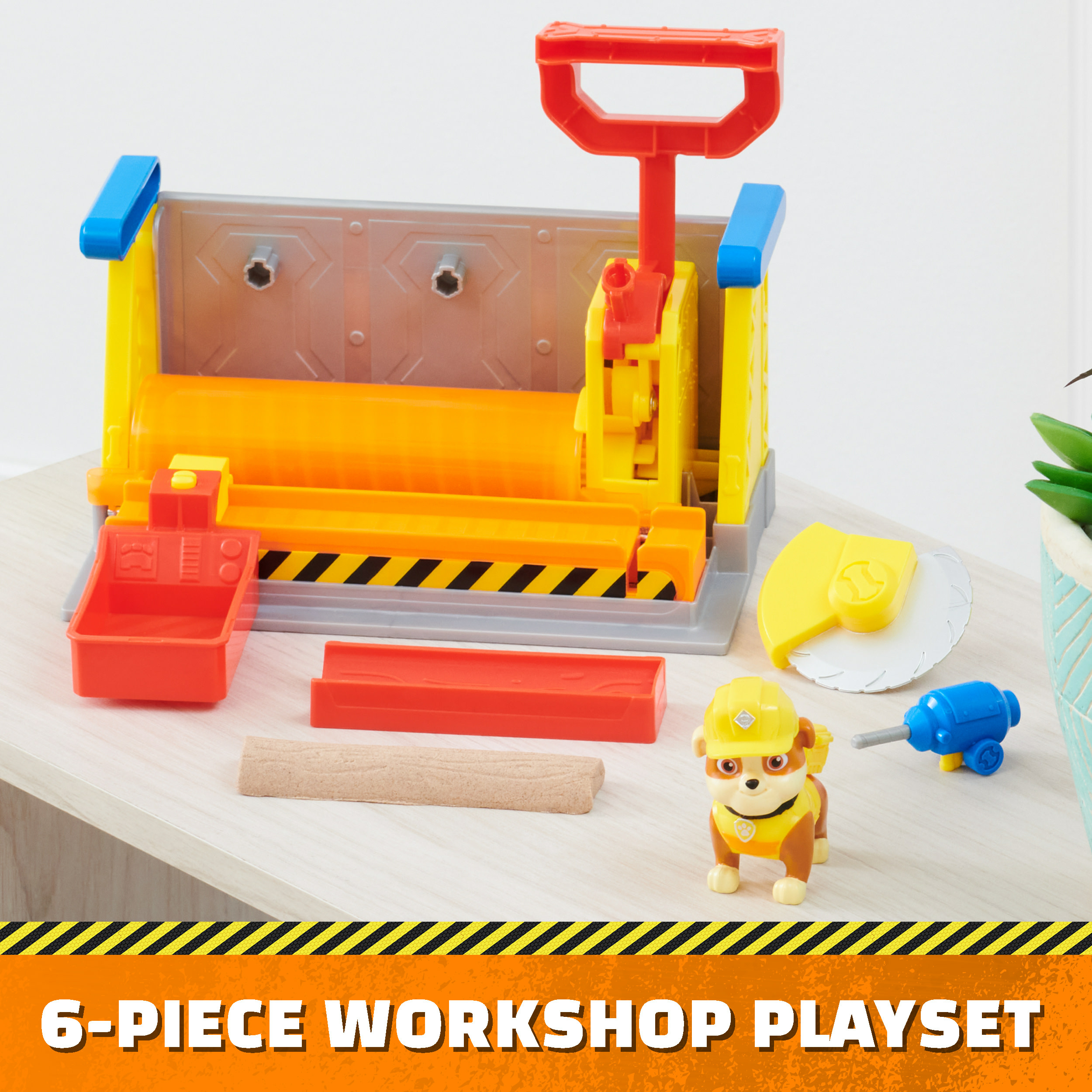Ein 6-teiliges Werkstatt-Spielset mit einer Rubble-Figur und verschiedenen Werkzeugen.