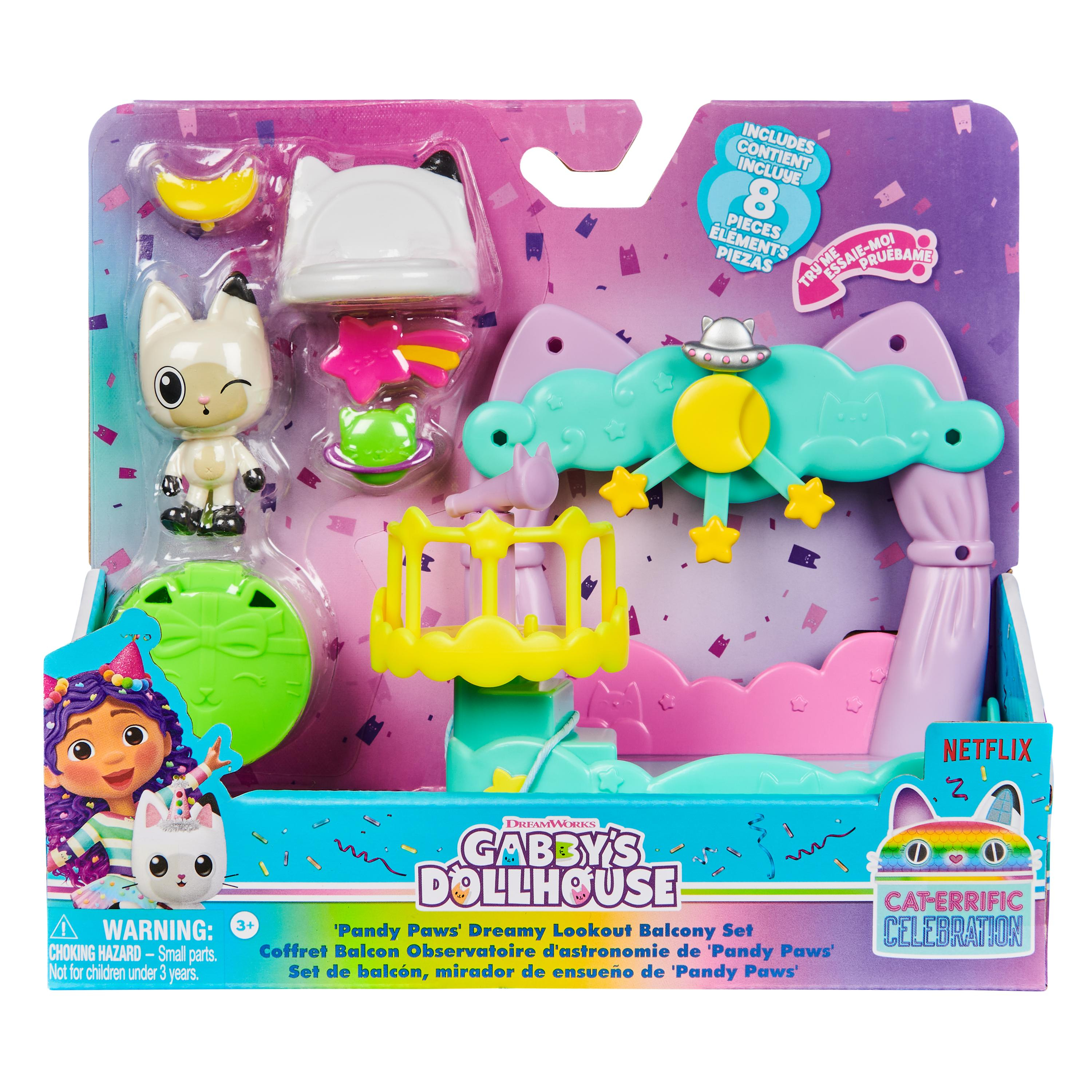Eine Gabby's Dollhouse Spielzeugbox mit Katzenfiguren und Zubehör in leuchtenden Farben.