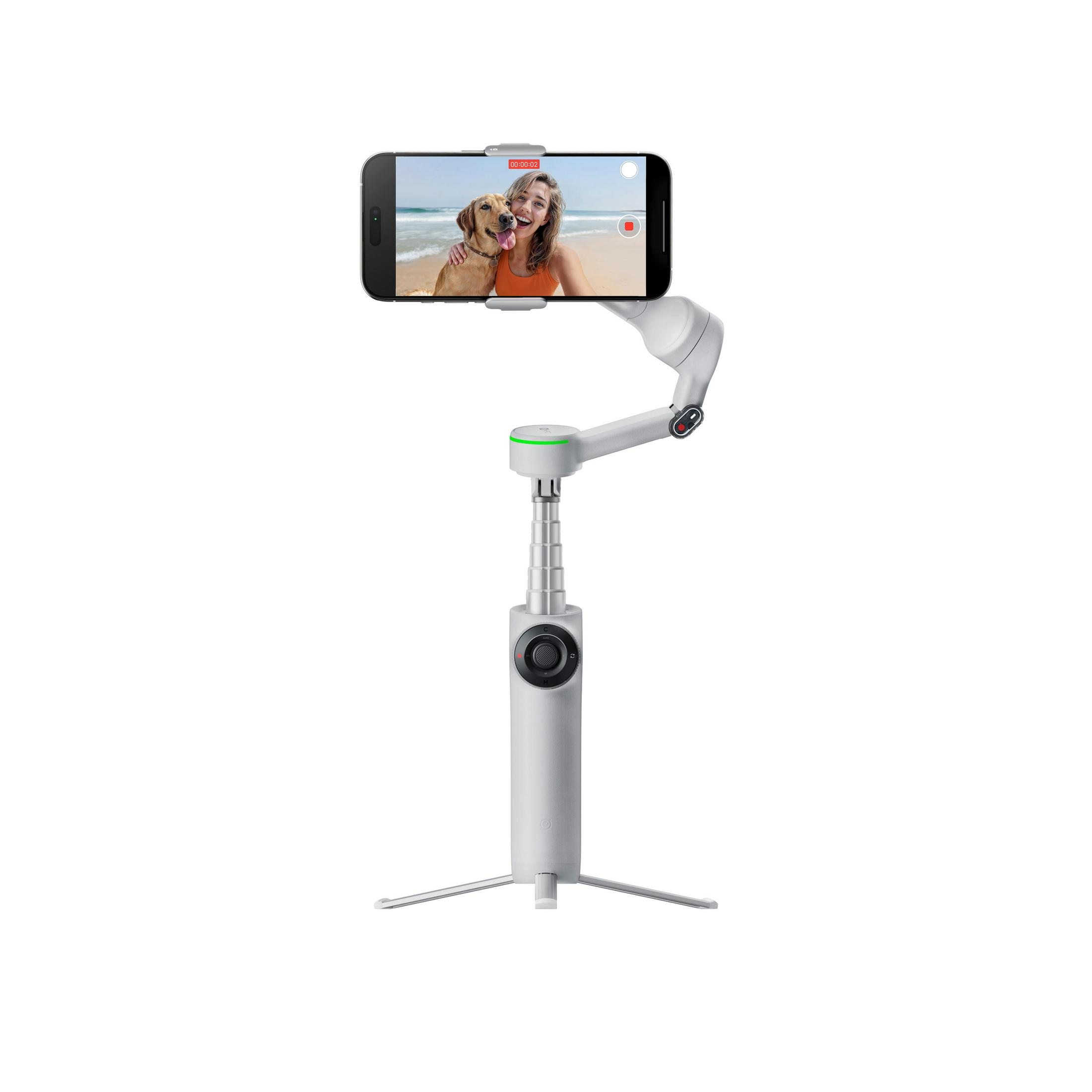 Gimbal blanc avec téléphone fixé, sur trépied, avec une femme à l'écran.
