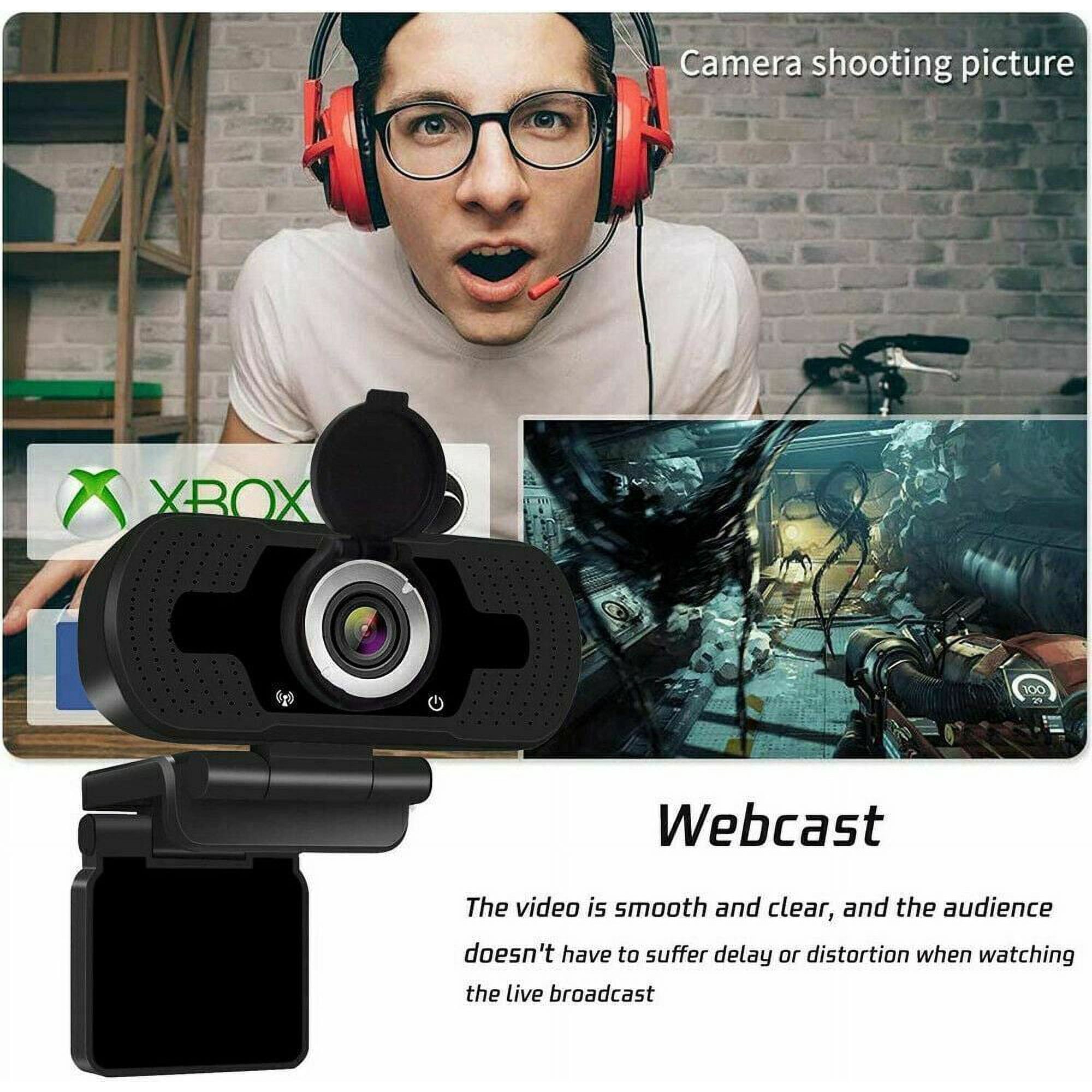 Mann mit Kopfhörern und Webcam, Gaming-Bildschirm, mit einem Screenshot-Overlay.