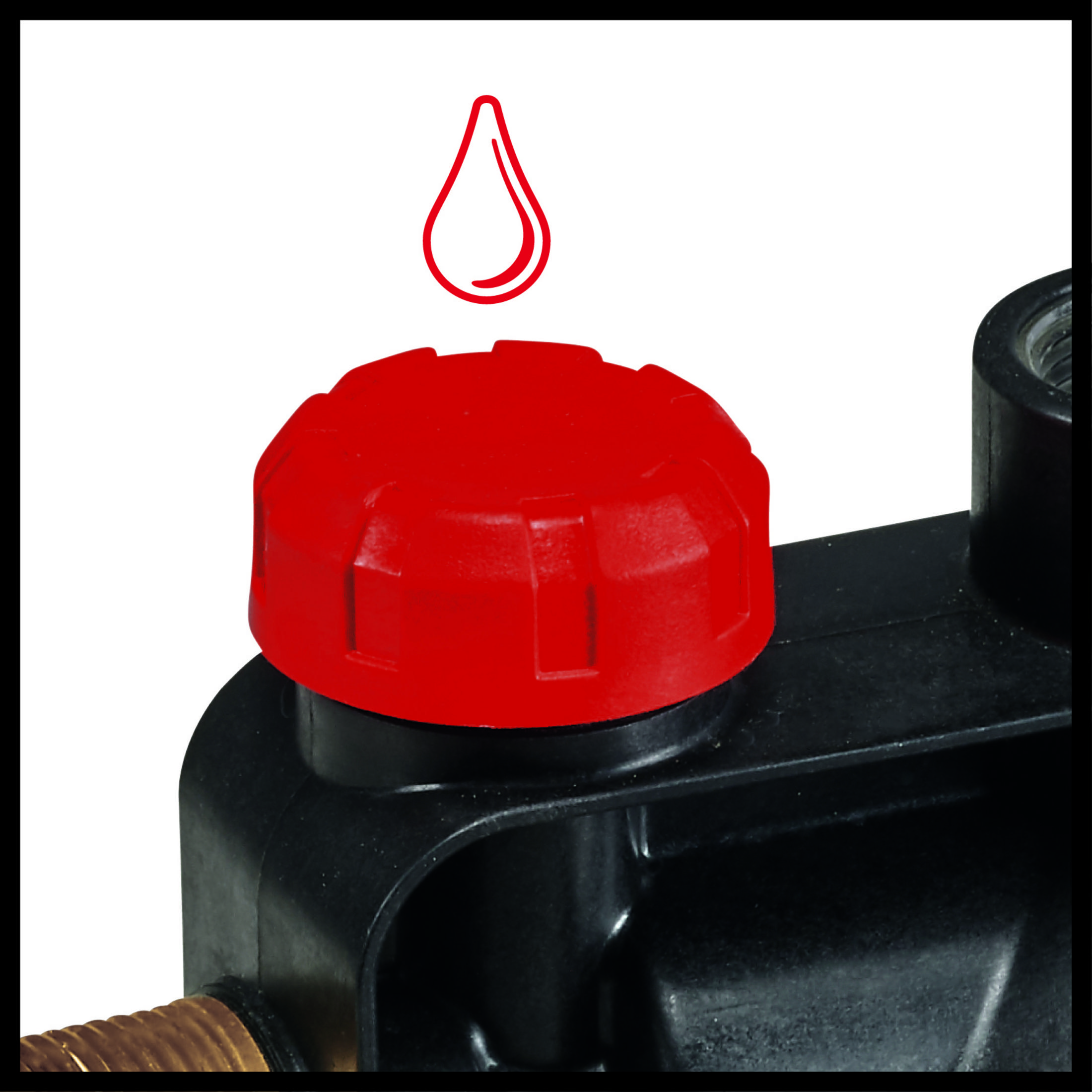 Zbliżenie czarnego urządzenia z czerwoną nasadką i czerwoną ikoną kropli.