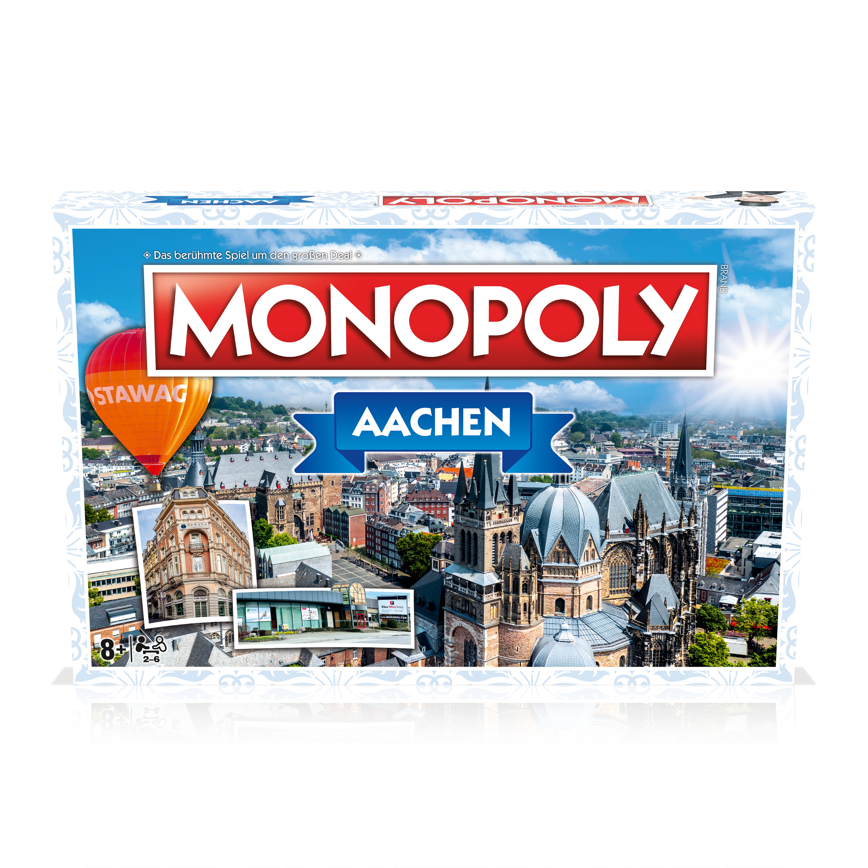 Monopoly-Brettspielbox mit der Stadt Aachen, Deutschland, mit blauem Himmel und Gebäudebildern.