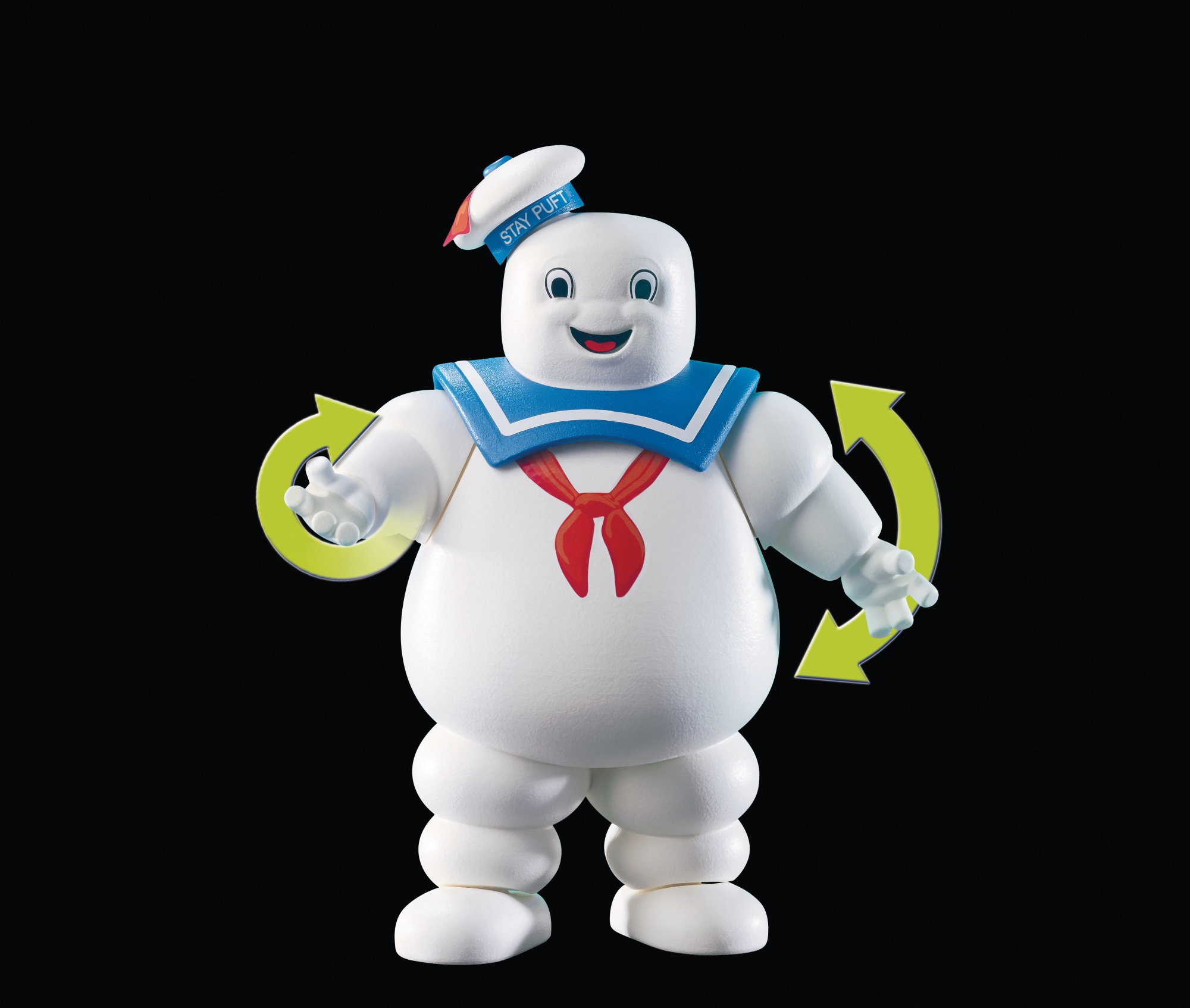 Ein weißes Stay Puft Marshmallow Man Spielzeug mit blauem Matrosenanzug. Grüne Pfeile zeigen drehende Arme.
