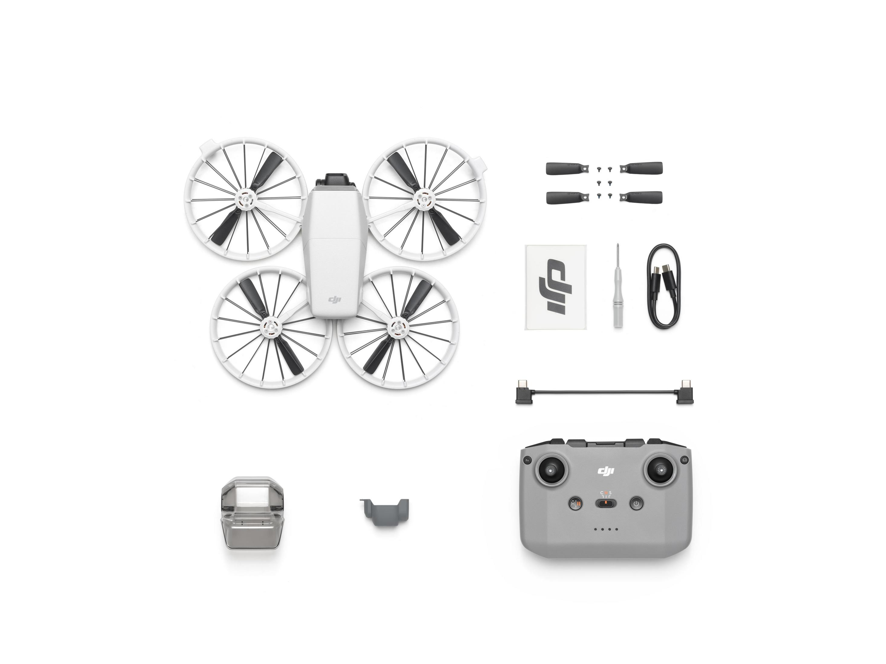 Componentes del dron: dron blanco, hélices, mando, cable de carga y accesorios.