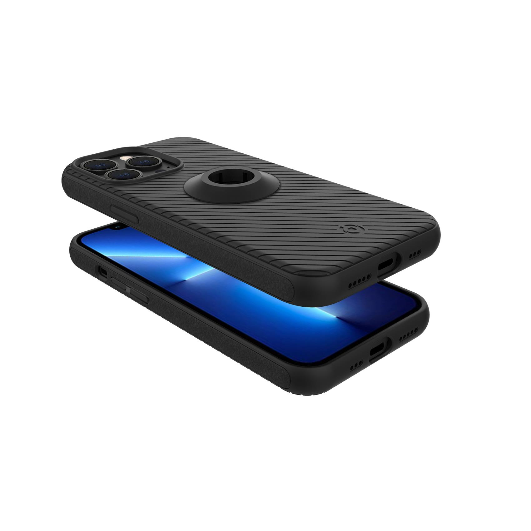 Un iPhone con una custodia nera, appoggiato sopra lo schermo del telefono, con un anello nero.