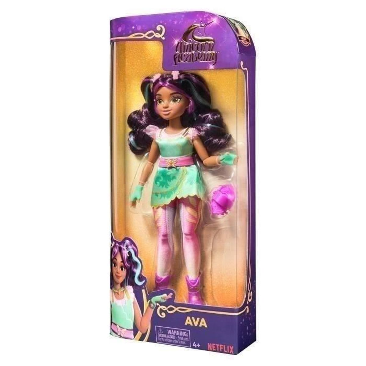 Una muñeca en una caja. La muñeca lleva un vestido turquesa y sostiene un bolso.