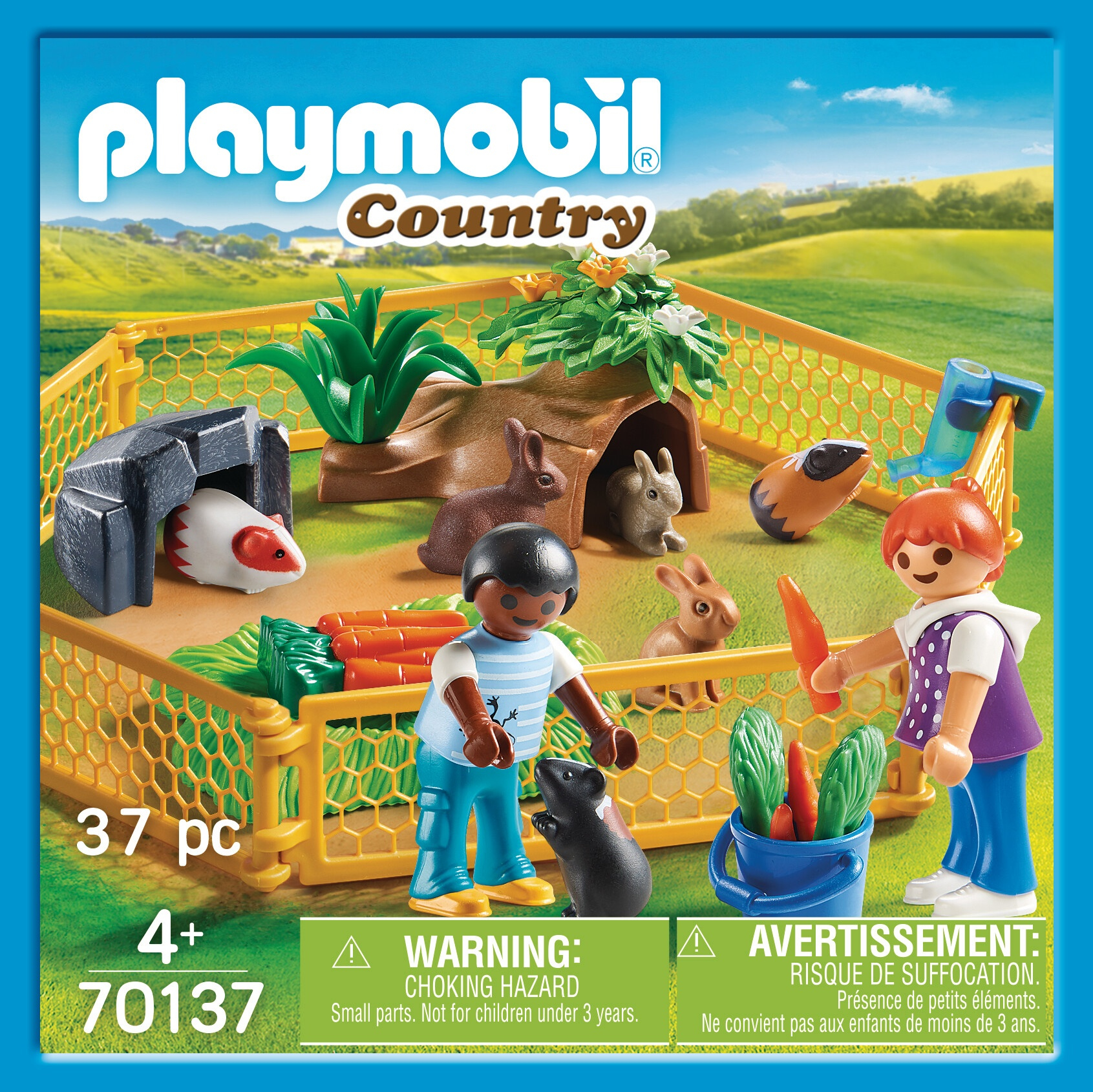 Set scatola Playmobil che mostra una scena di fattoria con personaggi, animali e accessori. La scatola è blu.