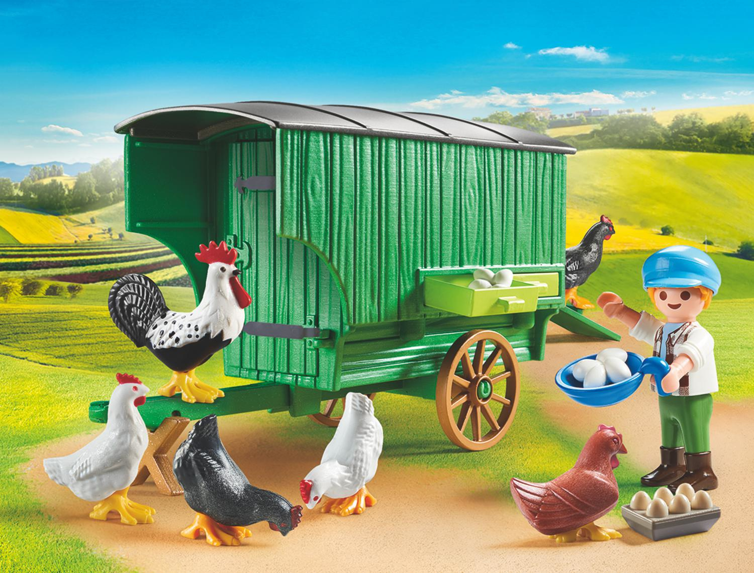 Un set fattoria Playmobil con gallo, gallina e figure di agricoltore con un carro.