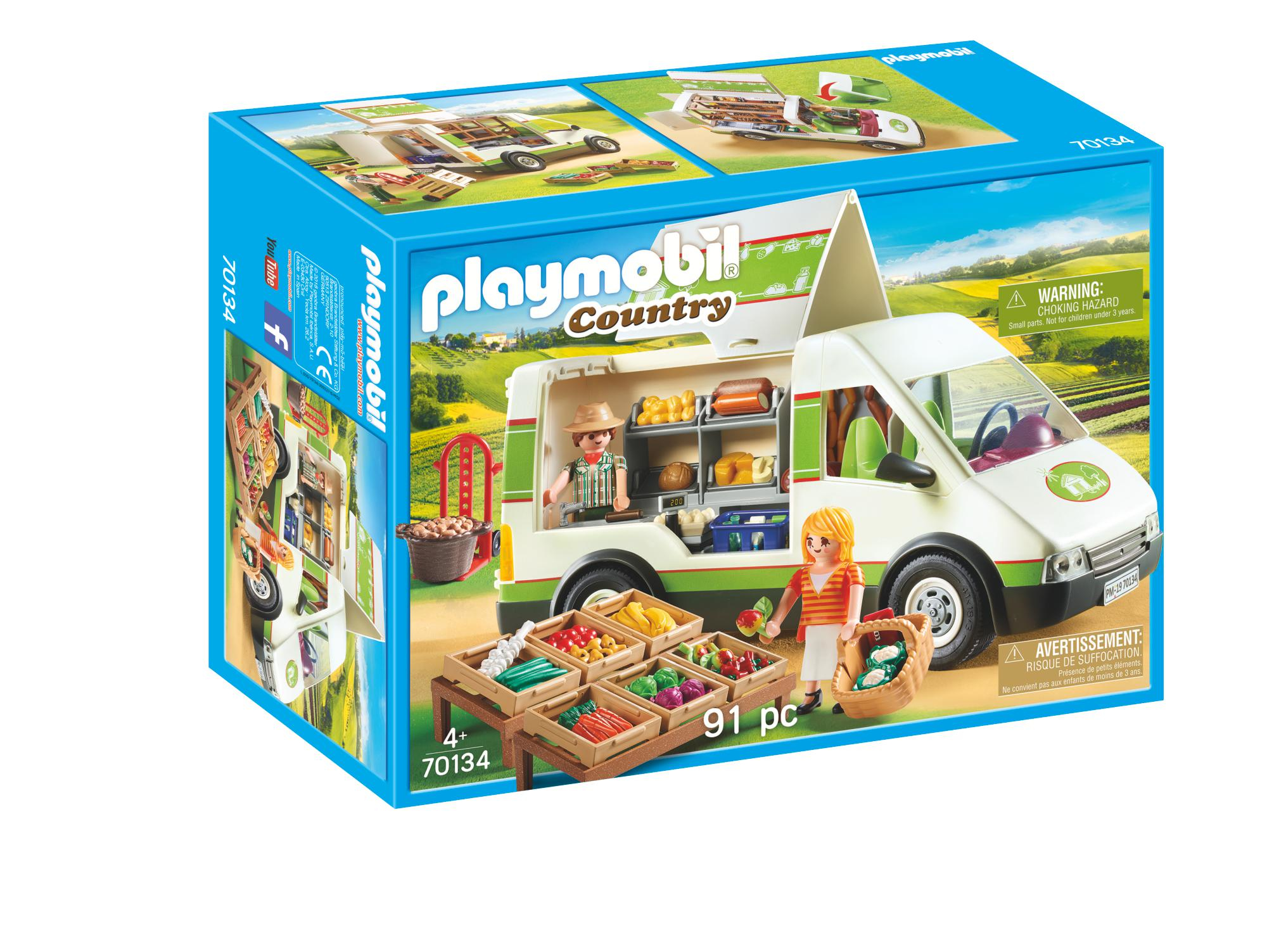 Pudełko z zabawkami Playmobil, z food truckiem i figurkami sprzedającymi produkty.