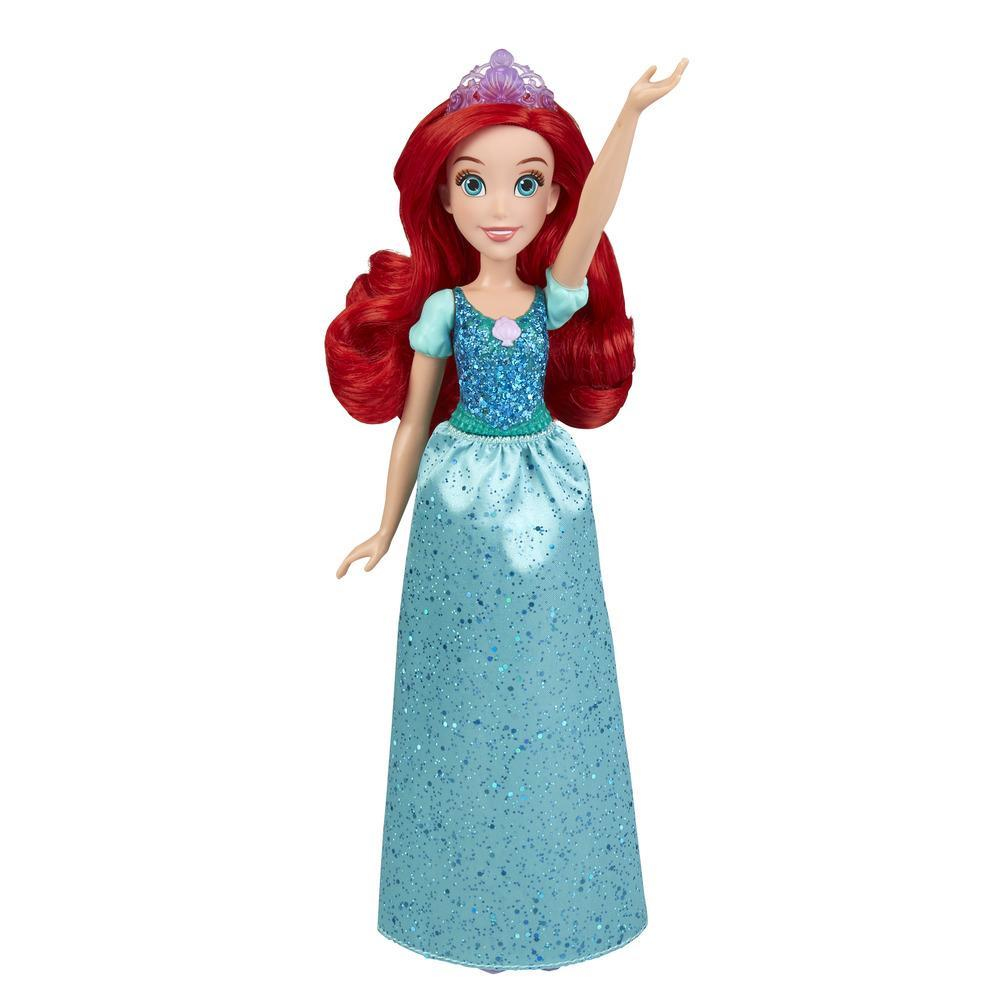 Bambola Ariel con vestito blu, capelli rossi e corona. Sfondo viola.