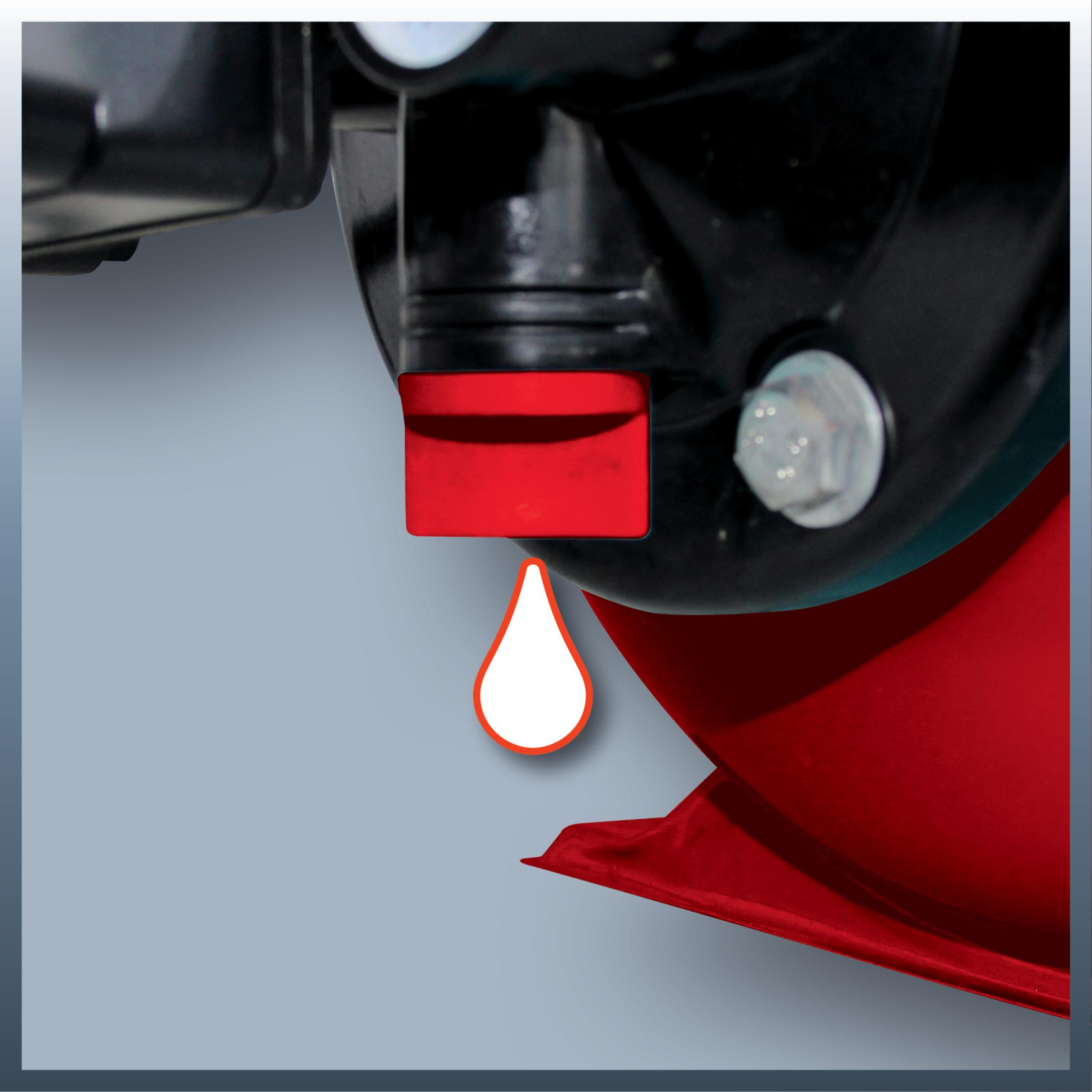Primer plano de un componente de máquina negro, con asa roja y gráfico de gota. Fondo gris.