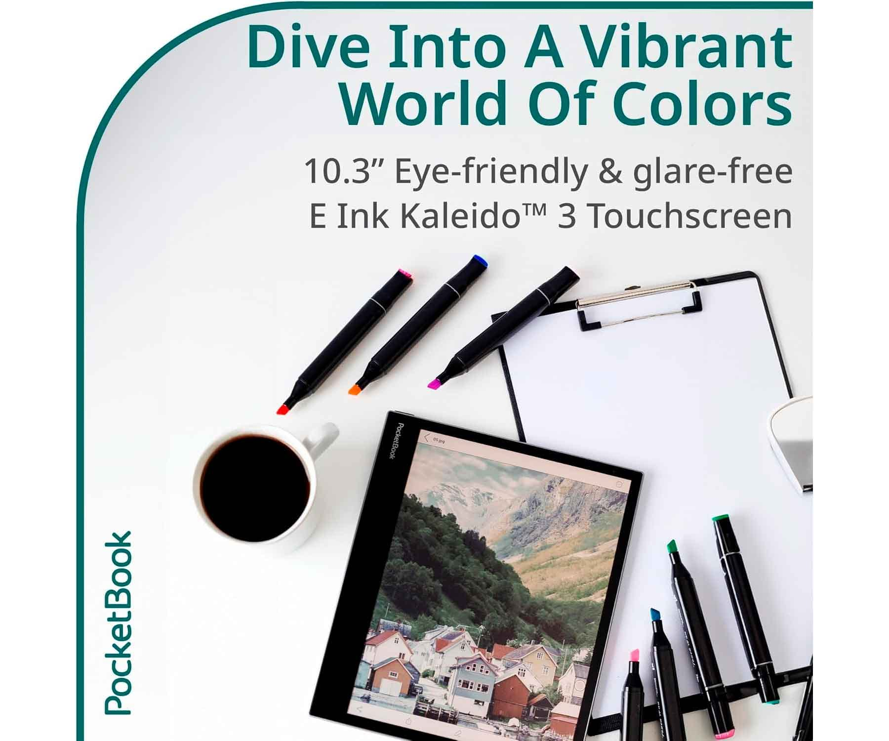 Tablet e-ink z tekstem i długopisami na białej powierzchni.