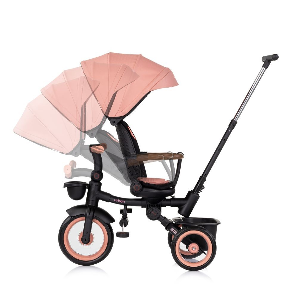 Baby-Dreirad mit rosa Verdeck und schwarzem Rahmen. Auf weißem Hintergrund.