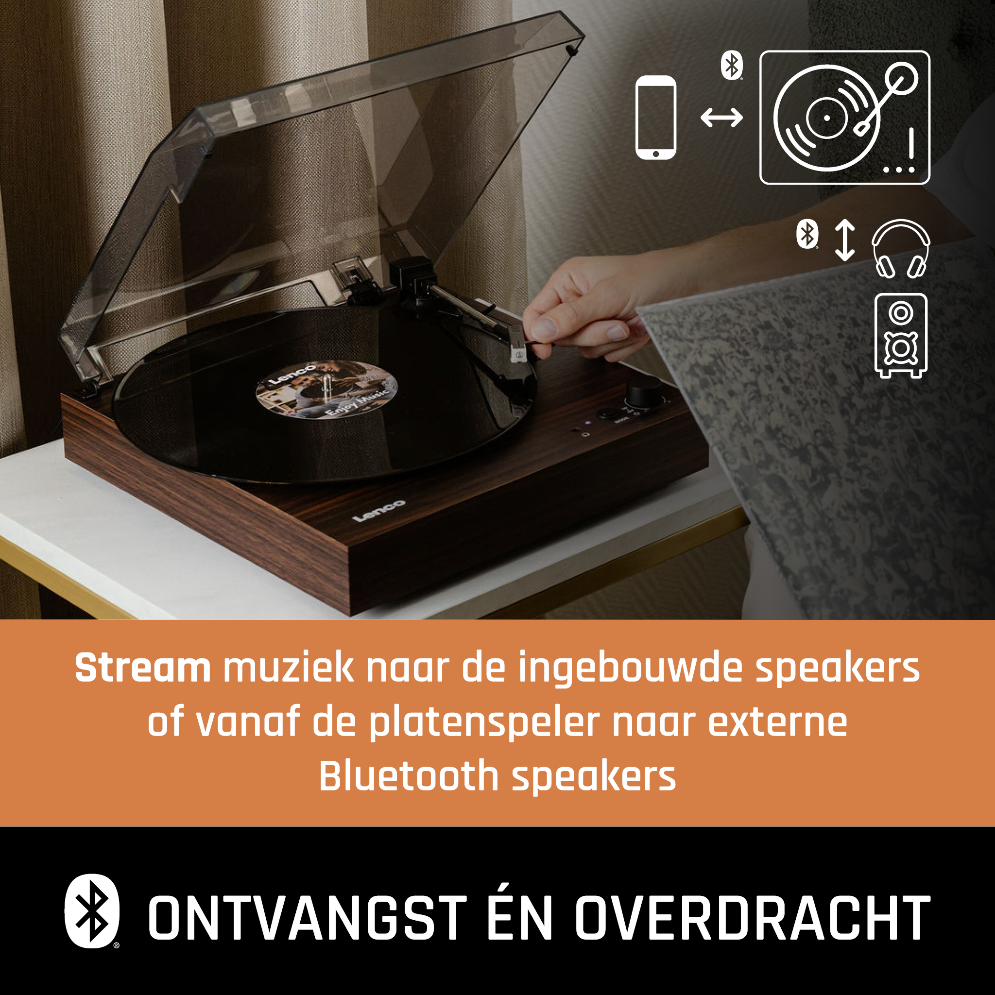 A vinyl record player with a transparent cover.