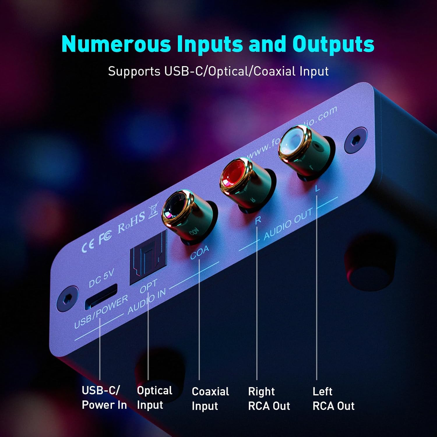 Gros plan sur les entrées et sorties d'un appareil audio. Les étiquettes incluent USB, optique et RCA.