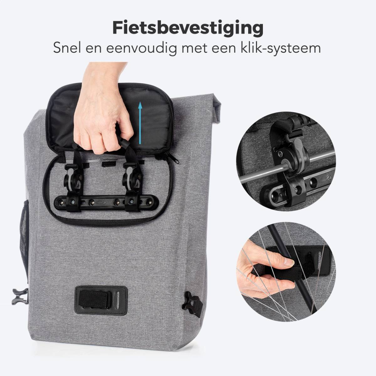 Gray bike bag with mounting system being opened. A hand is shown demonstrating how to open the bag.