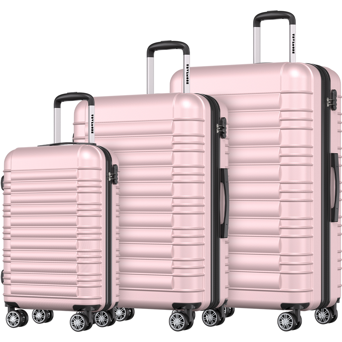Drie roze koffers, een kleine, middelgrote en grote.