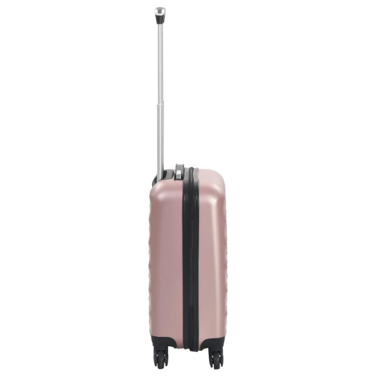 Ein rosa Reisekoffer mit strukturierter Oberfläche, Griff und Rollen, von der Seite gesehen.