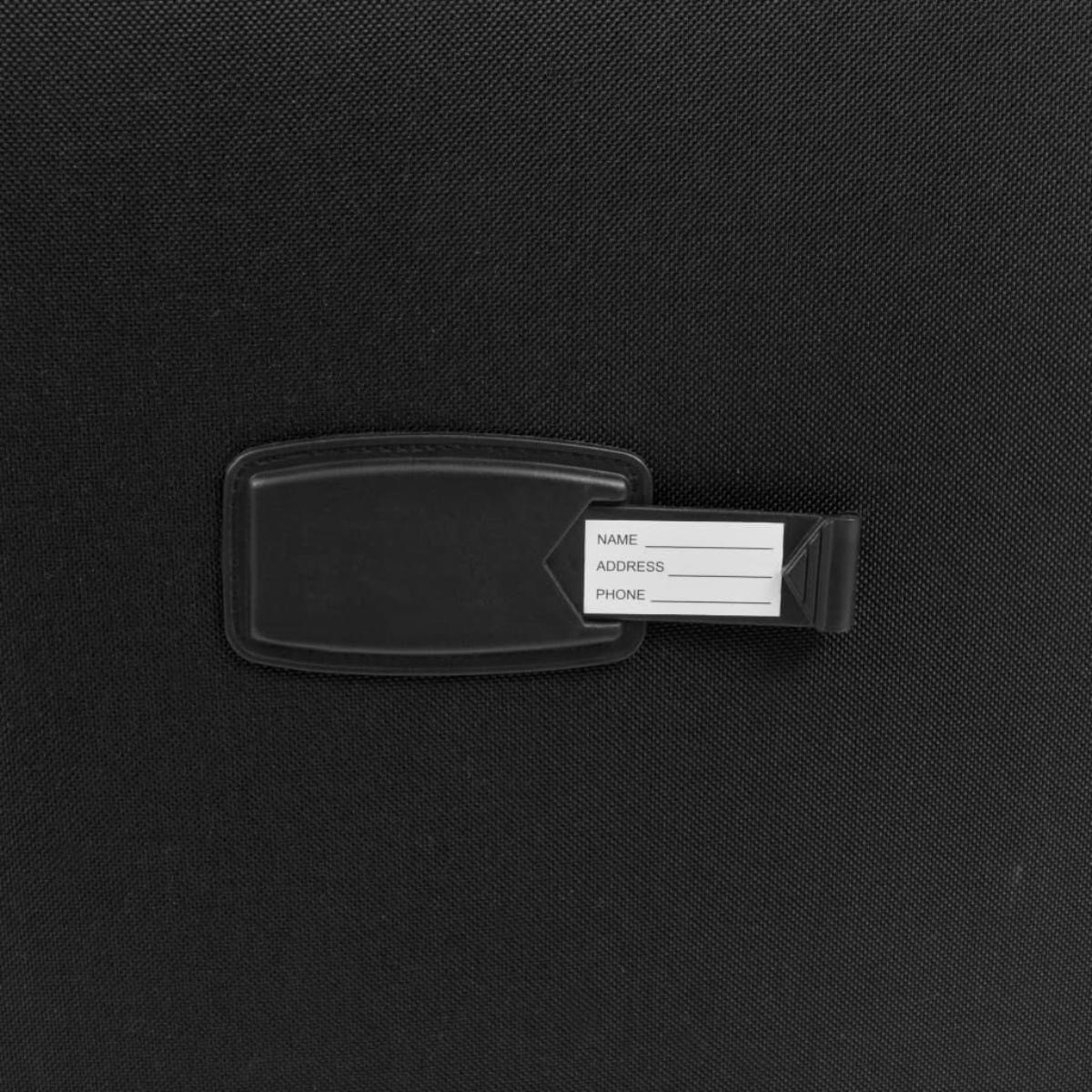 Ein schwarzes Gepäckanhänger mit Platz für Name, Adresse und Telefon ist an einer schwarzen Oberfläche befestigt.