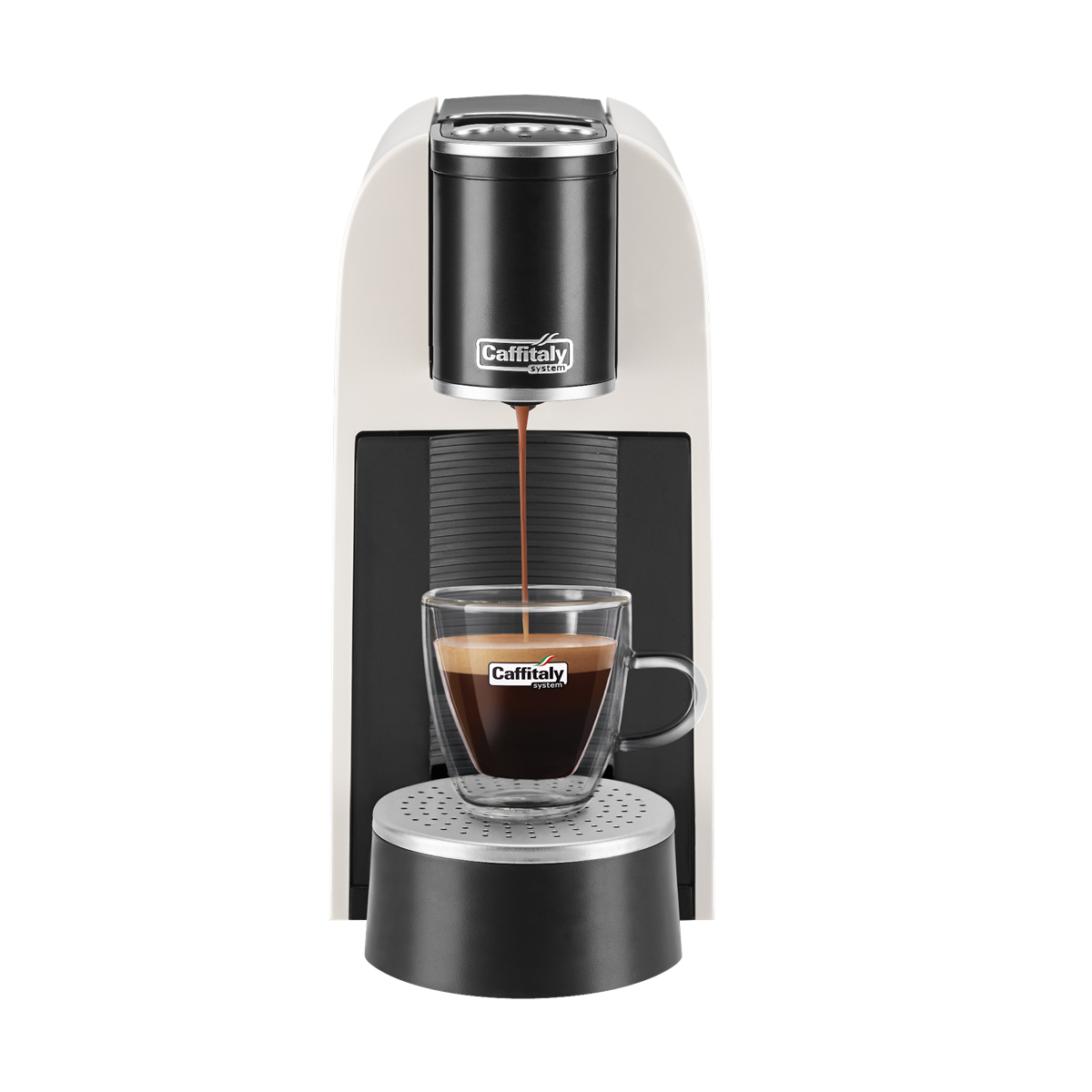 Eine Caffitaly Kaffeemaschine. Kaffee fließt in eine doppelwandige Glastasse.
