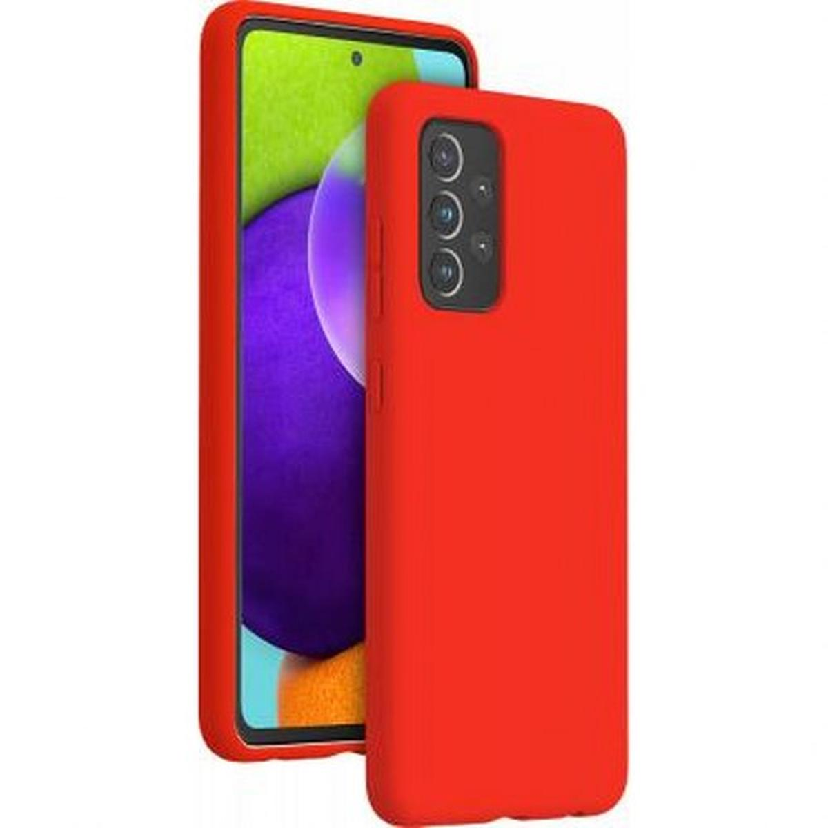 Custodia rossa per telefono accanto a un telefono. Il telefono è dentro.