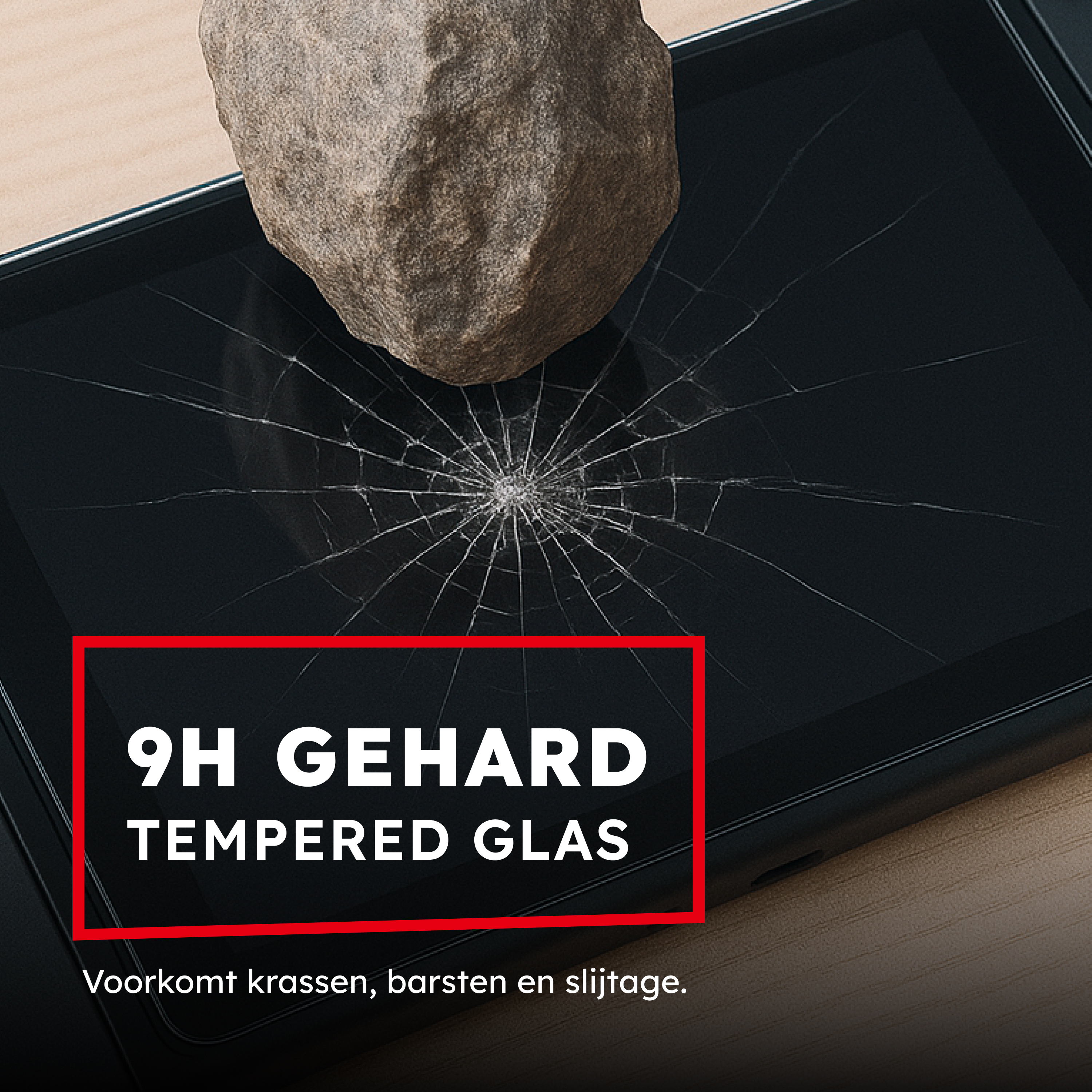 Een steen op een gebarsten scherm met tekst: 9H gehard glas.
