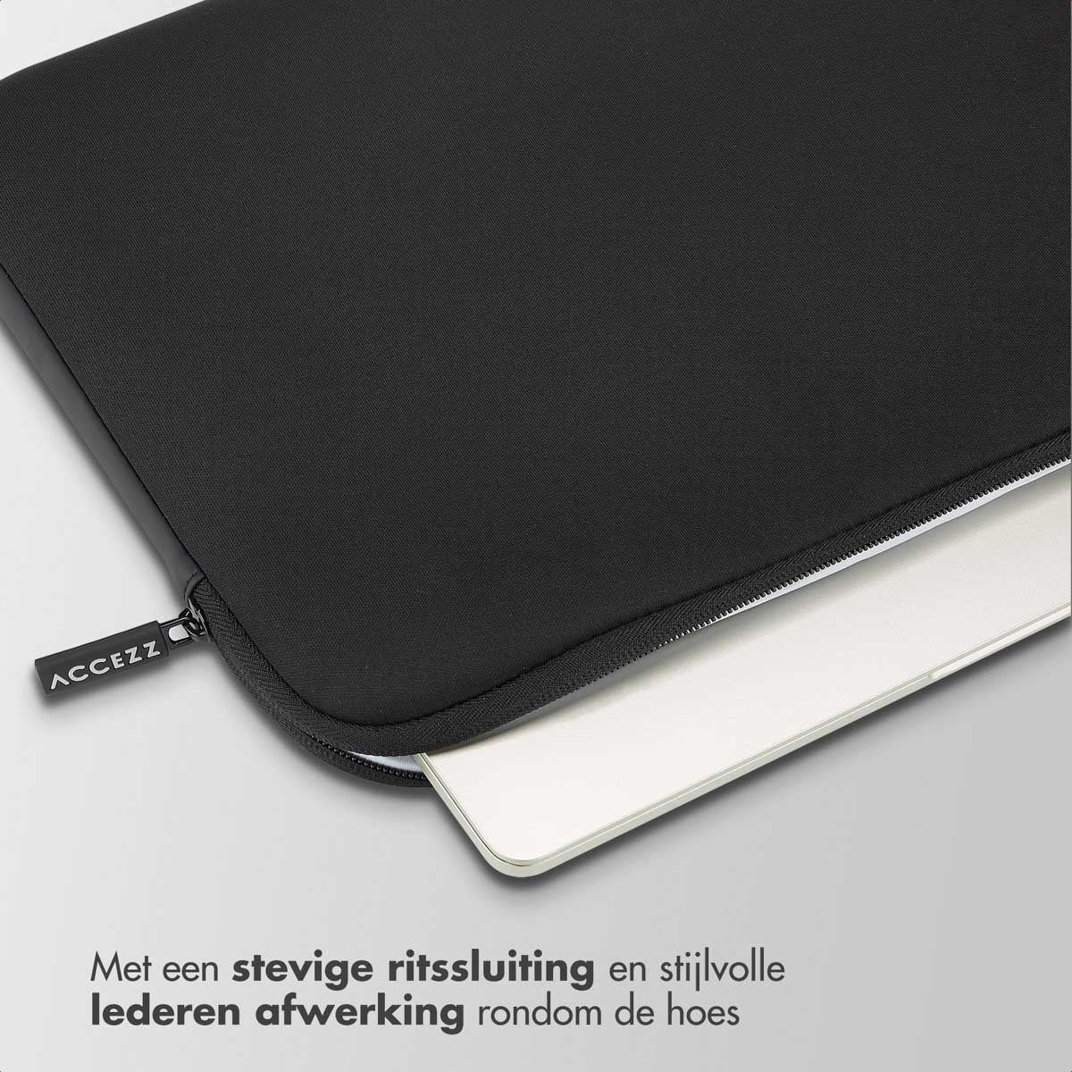 Black laptop case with a zipper. A laptop is partially visible inside. Text says "ACCEZZ".