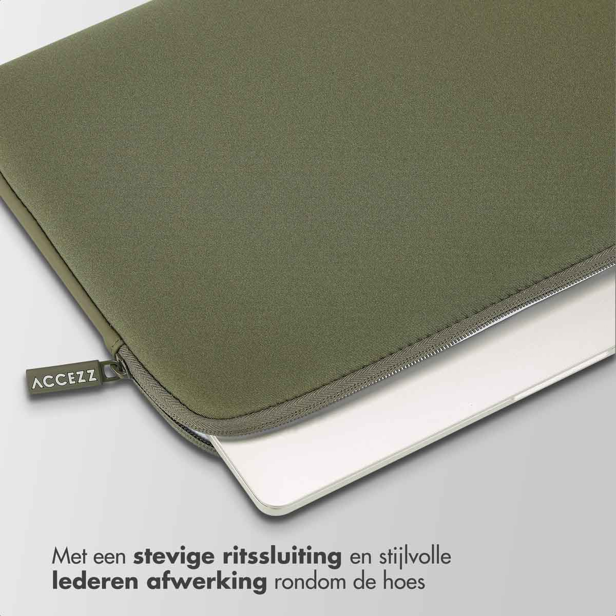 Green laptop sleeve, ACCEZZ label, zipper detail, white interior. 
