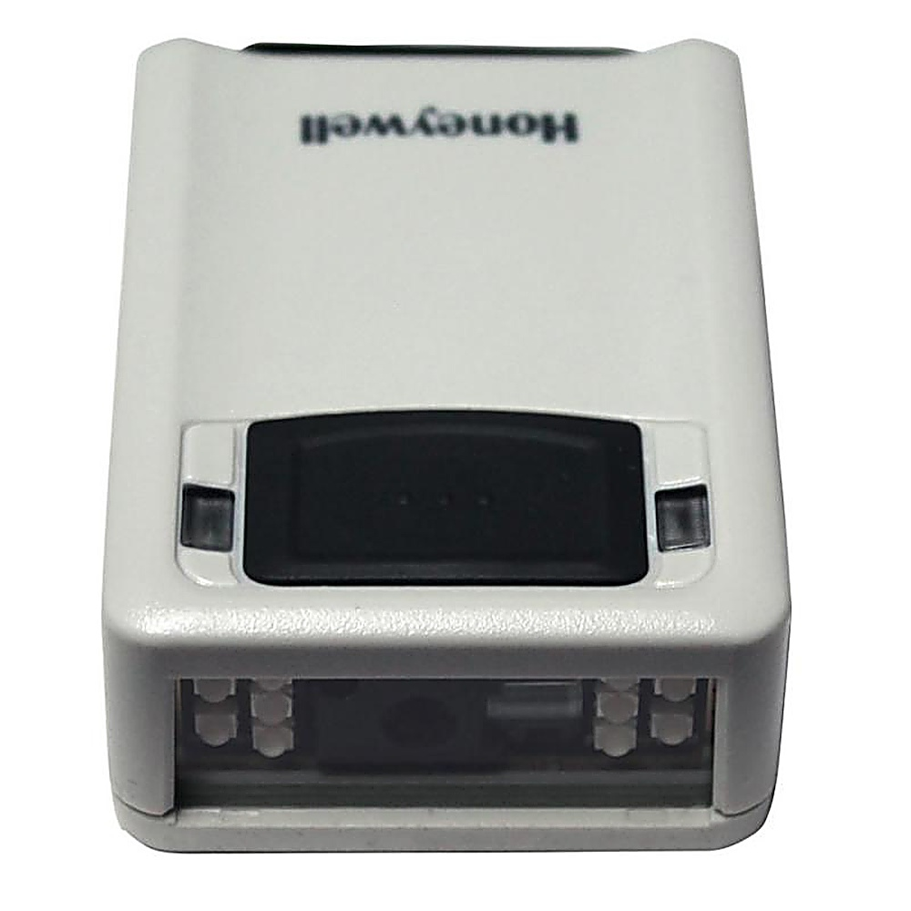 Uno scanner di codici a barre Honeywell bianco con un'area di scansione nera.