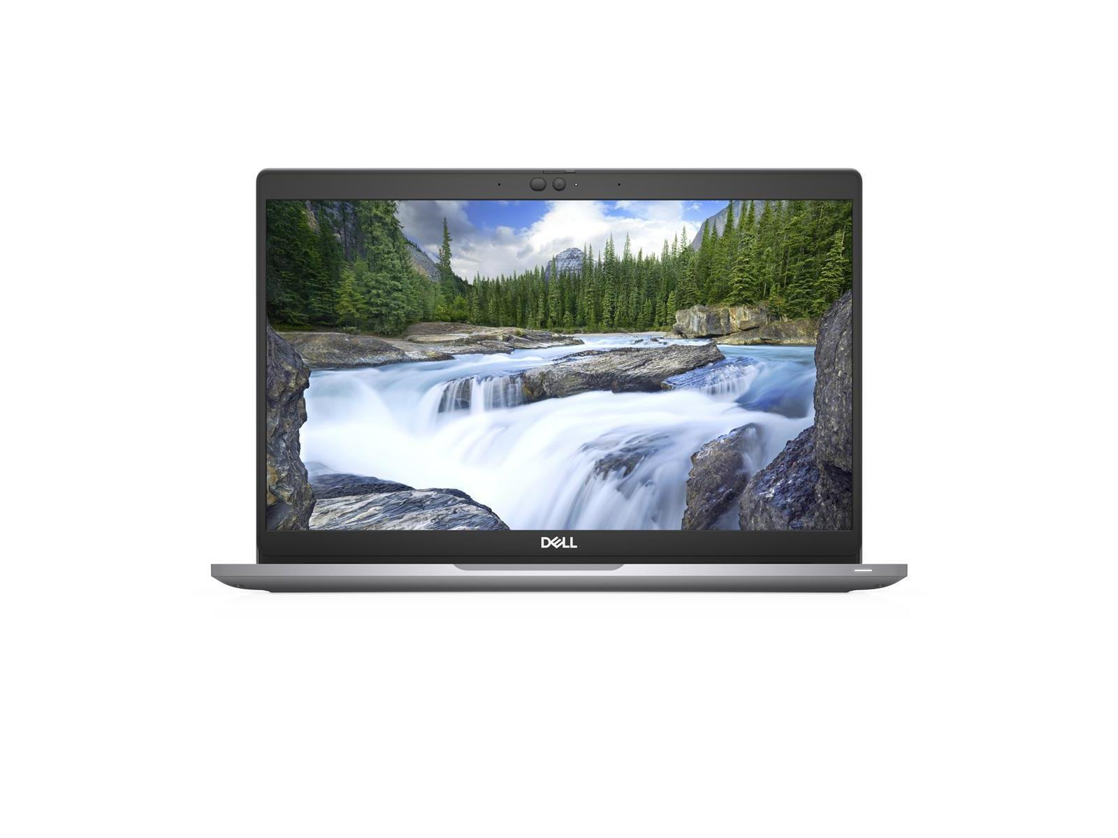 Laptop mit Wasserfall-Szene und grünen Bäumen im Hintergrund.