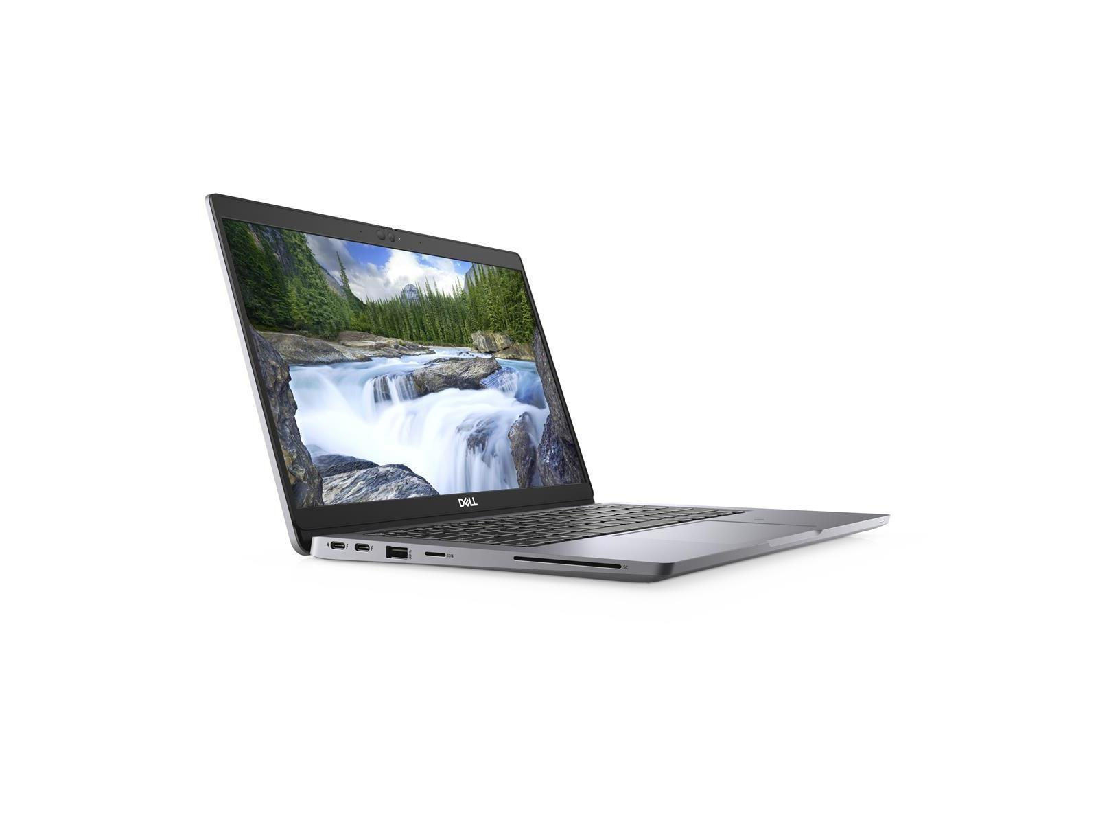 Grauer Laptop, geöffnet, mit Wasserfallszene auf dem Bildschirm. Weißer Hintergrund.