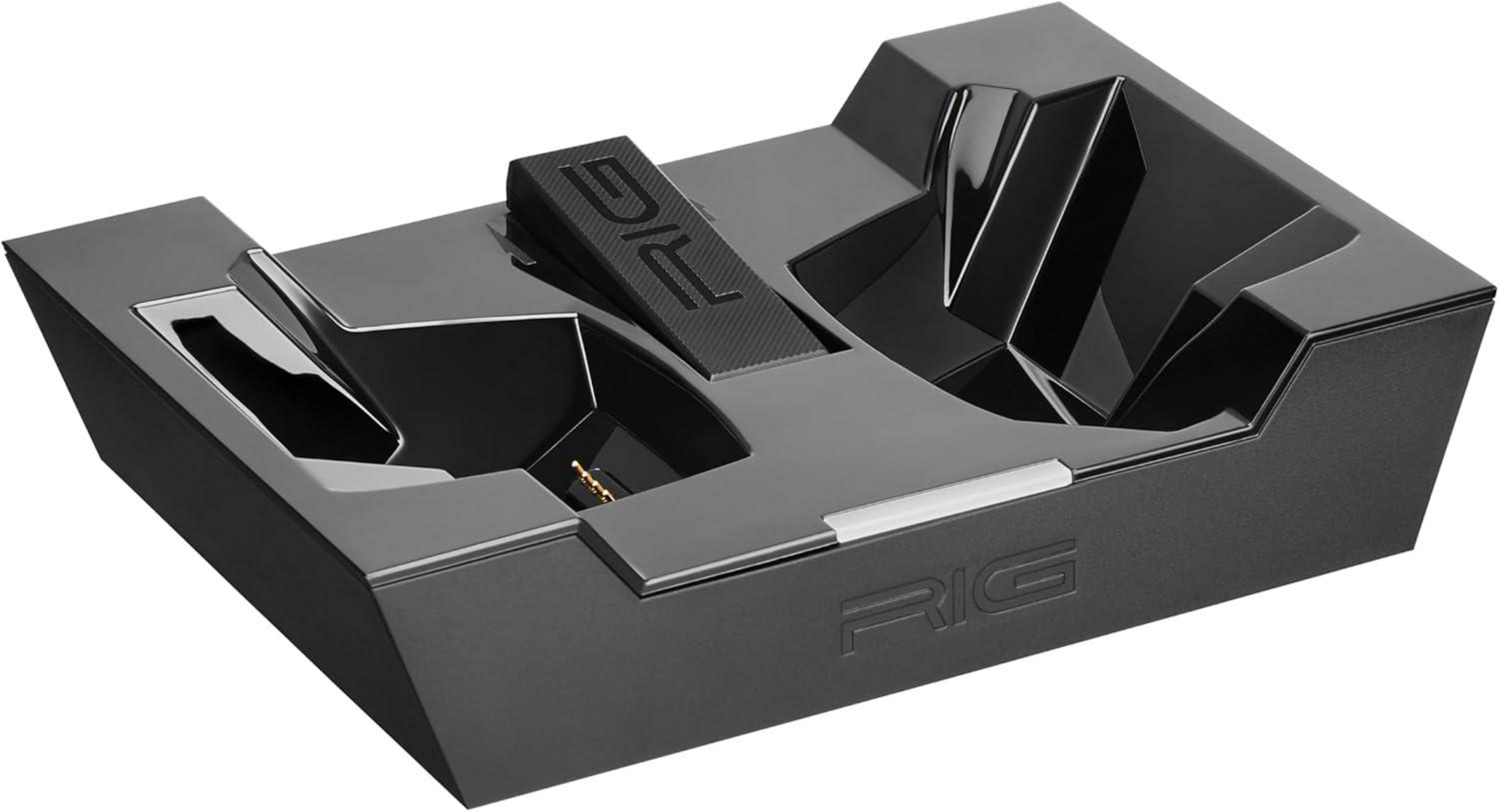 Czarny stojak na zestaw słuchawkowy RIG z logo RIG. Ma unikalny kształt i design.